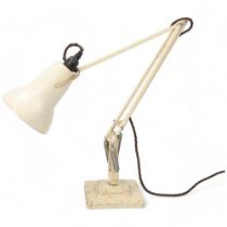 A Herbert Terry Anglepoise lamp, original cream paintwork, with two-step base, makers stamp,