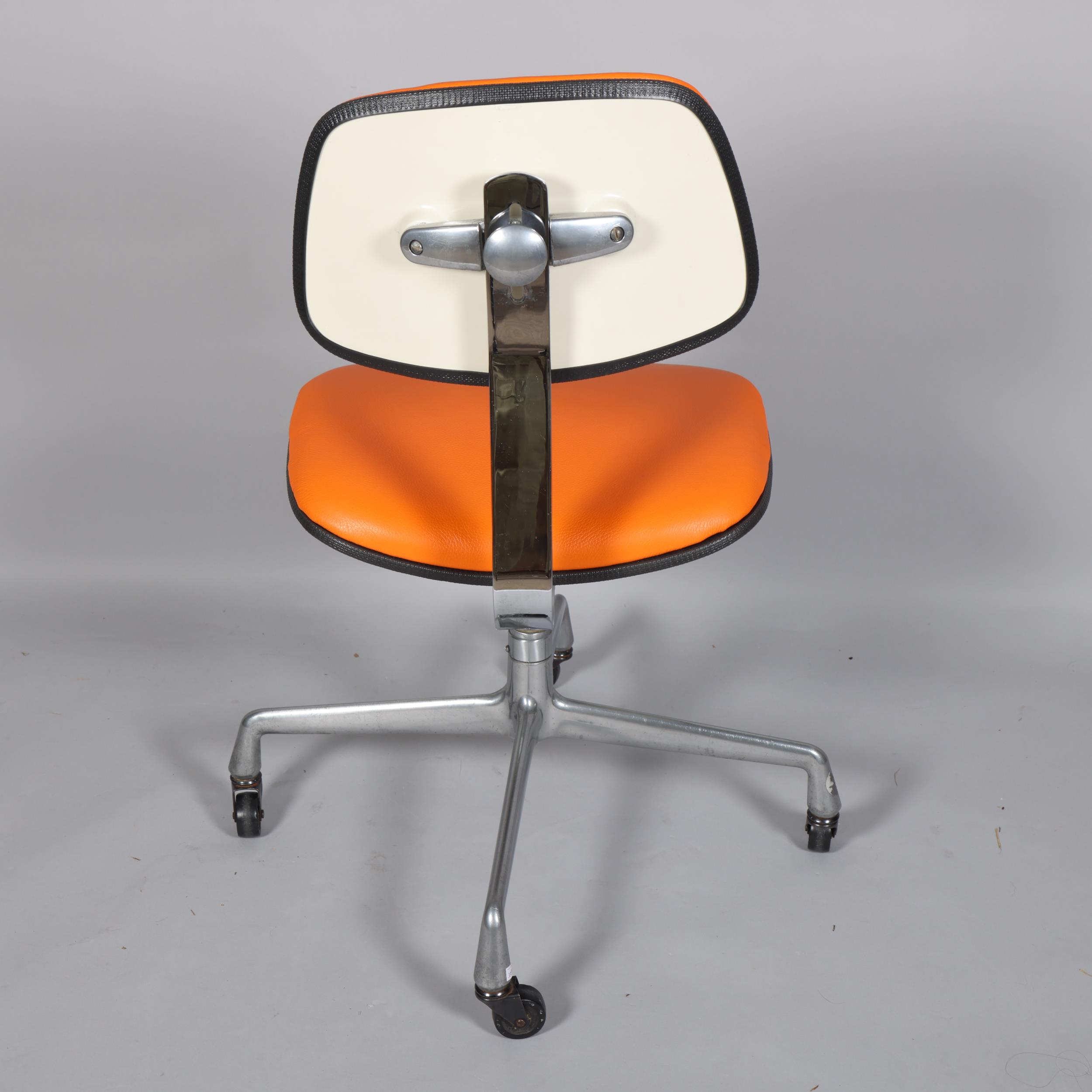 CHARLES EAMES, a rare Herman Miller EC228 secretarial chair, 1971, with orange leather upholstery, - Image 2 of 3