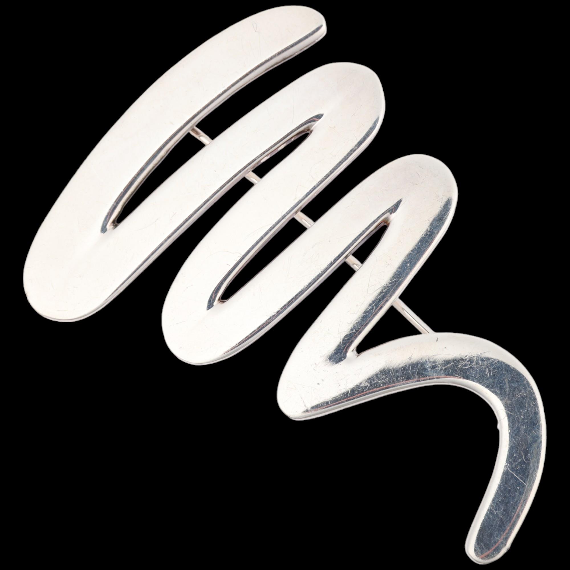 A sterling silver abstract squiggle brooch, maker AJ, import hallmarks Sheffield 1993, 57.7mm, 15.4g