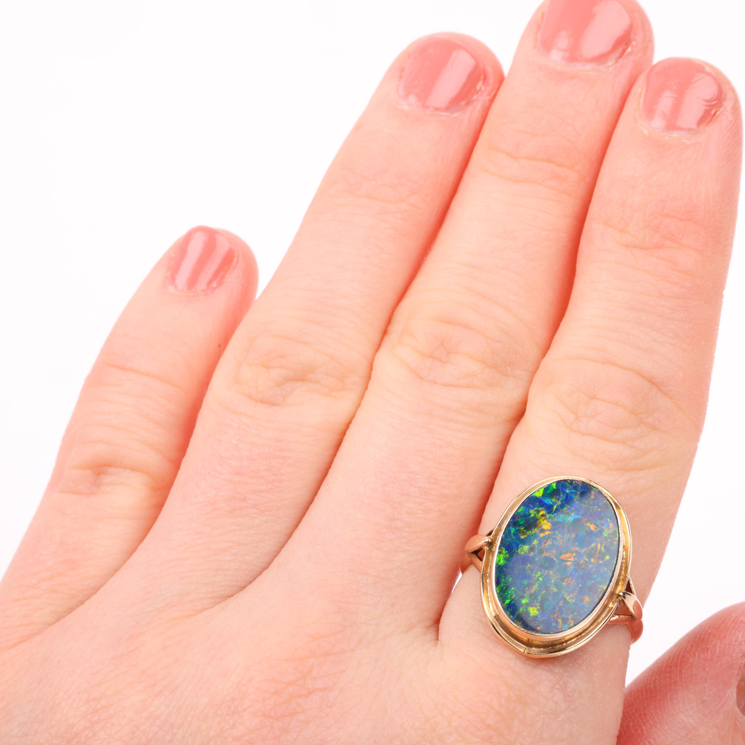 A late 20th century black opal doublet dress ring, apparently unmarked Continental gold settings, - Image 4 of 4