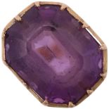 A mid-20th century amethyst dress ring, collet set with emerald step-cut amethyst, apparently