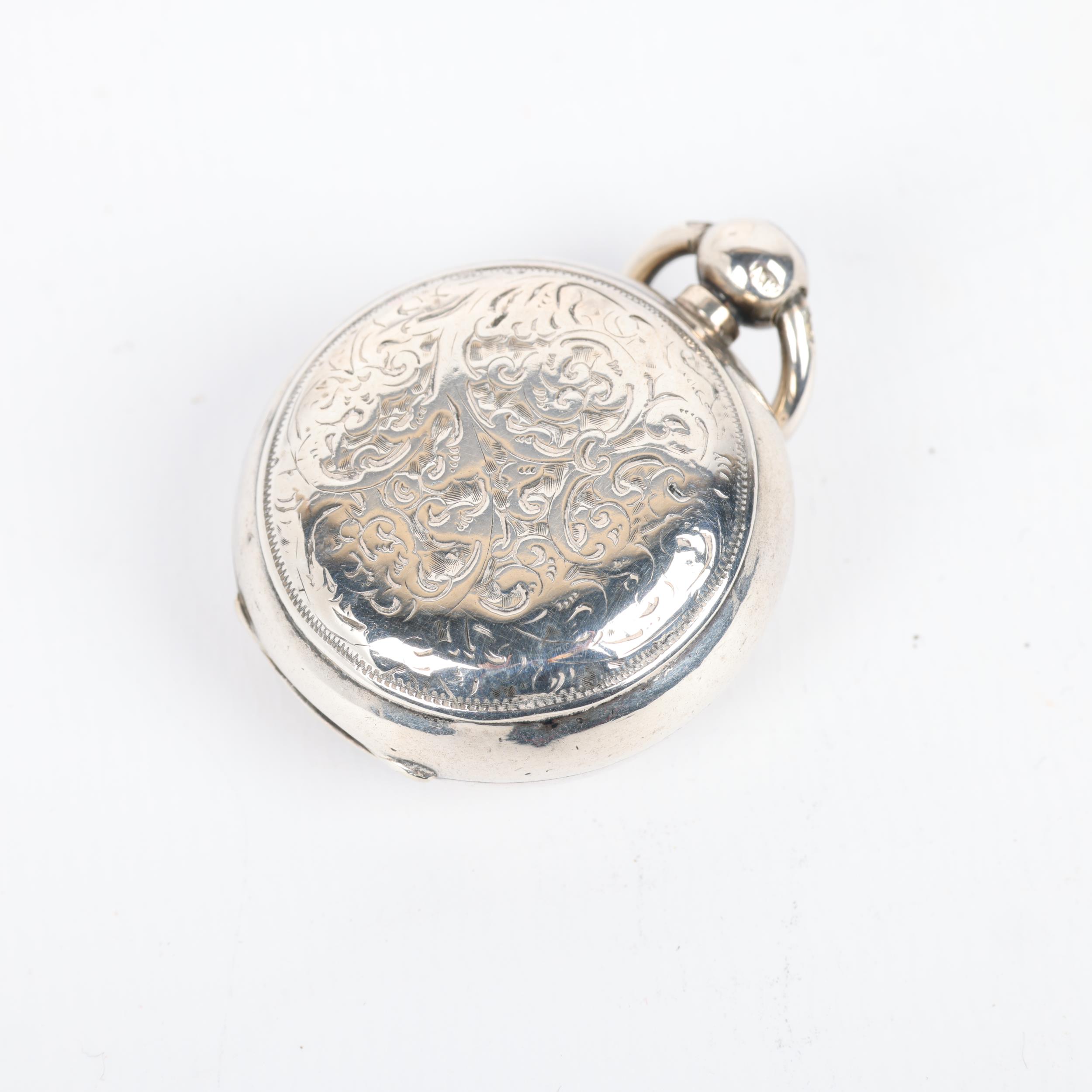 A Victorian silver sovereign case, Alfred Wigley, Birmingham 1895, circular form with foliate - Image 2 of 3