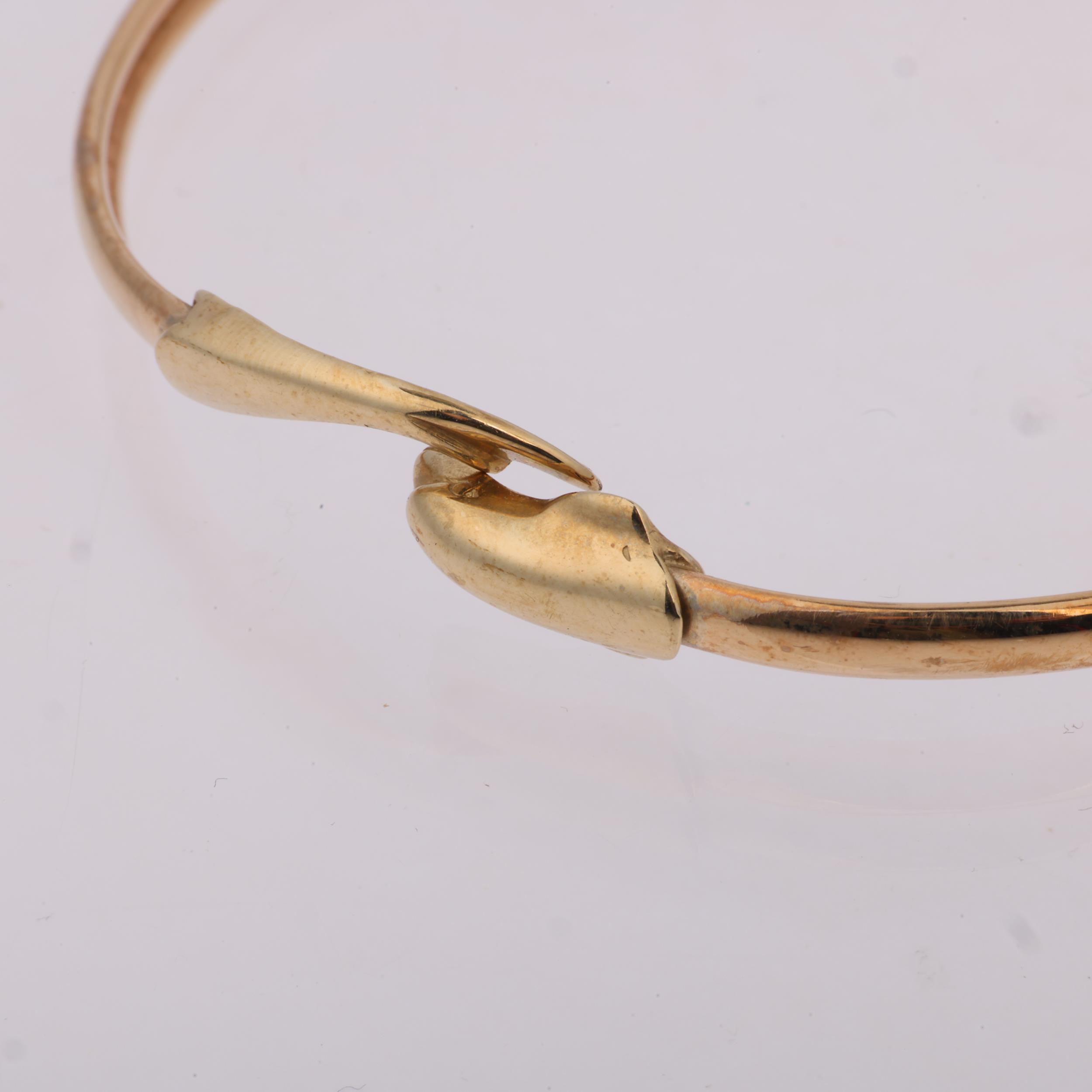A late 20th century 9ct gold dolphin torque bangle, maker CJ Ltd, Birmingham 1993, band width 3.6mm, - Image 2 of 4