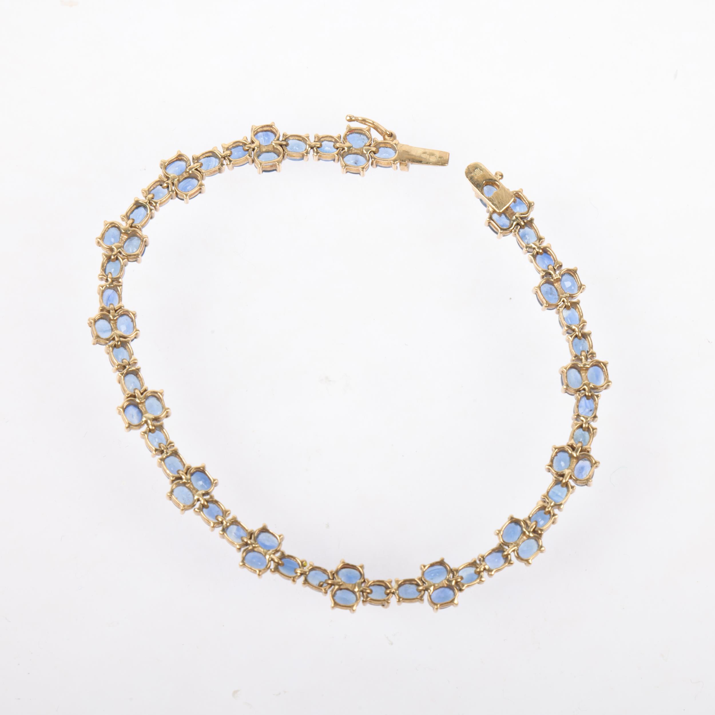 A modern 9ct gold sapphire tennis line bracelet, Birmingham 2005, set with oval mixed-cut sapphires, - Image 3 of 4