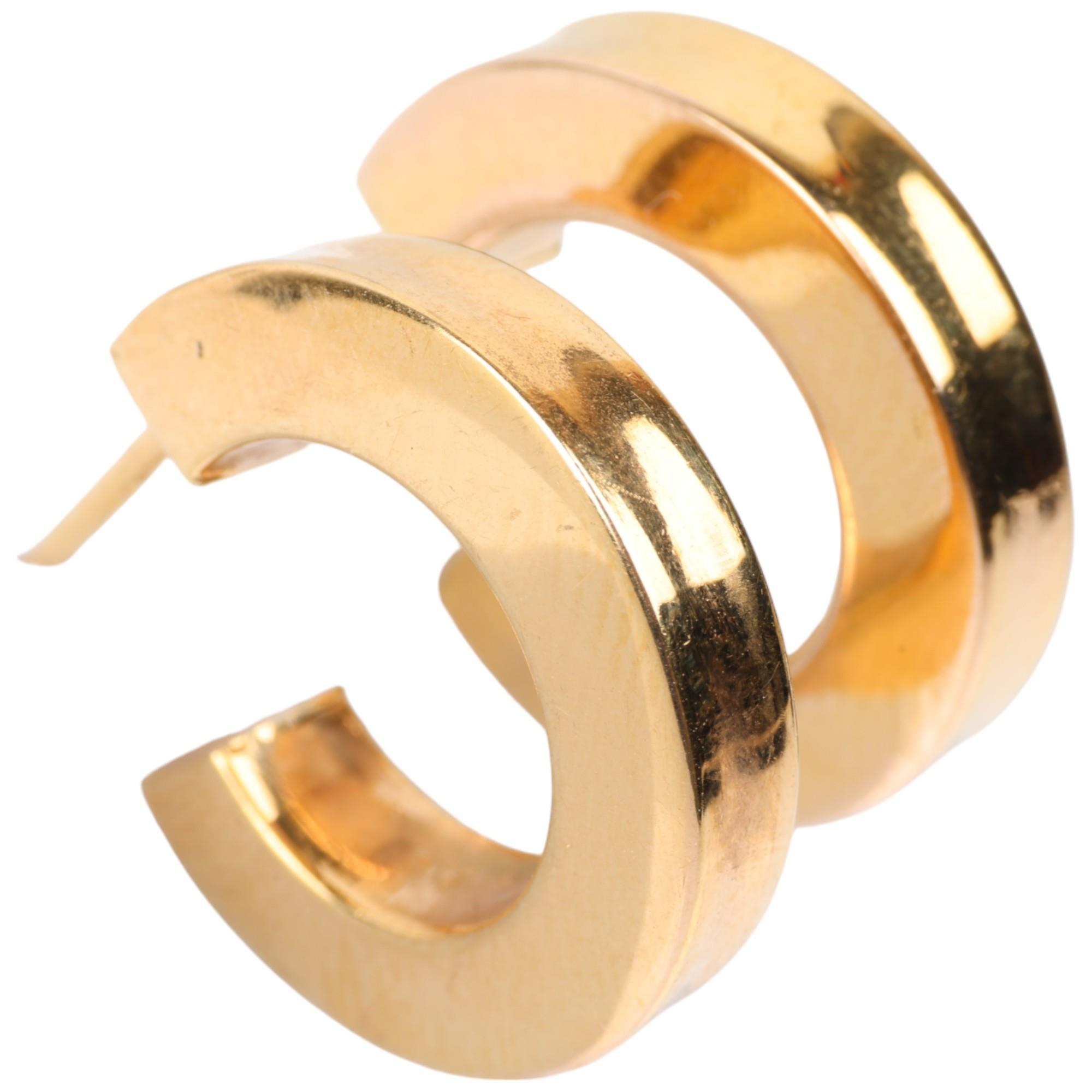 A pair of 9ct gold hoop earrings, with stud fittings, 18.2mm, 3.1g Condition Report: A few very