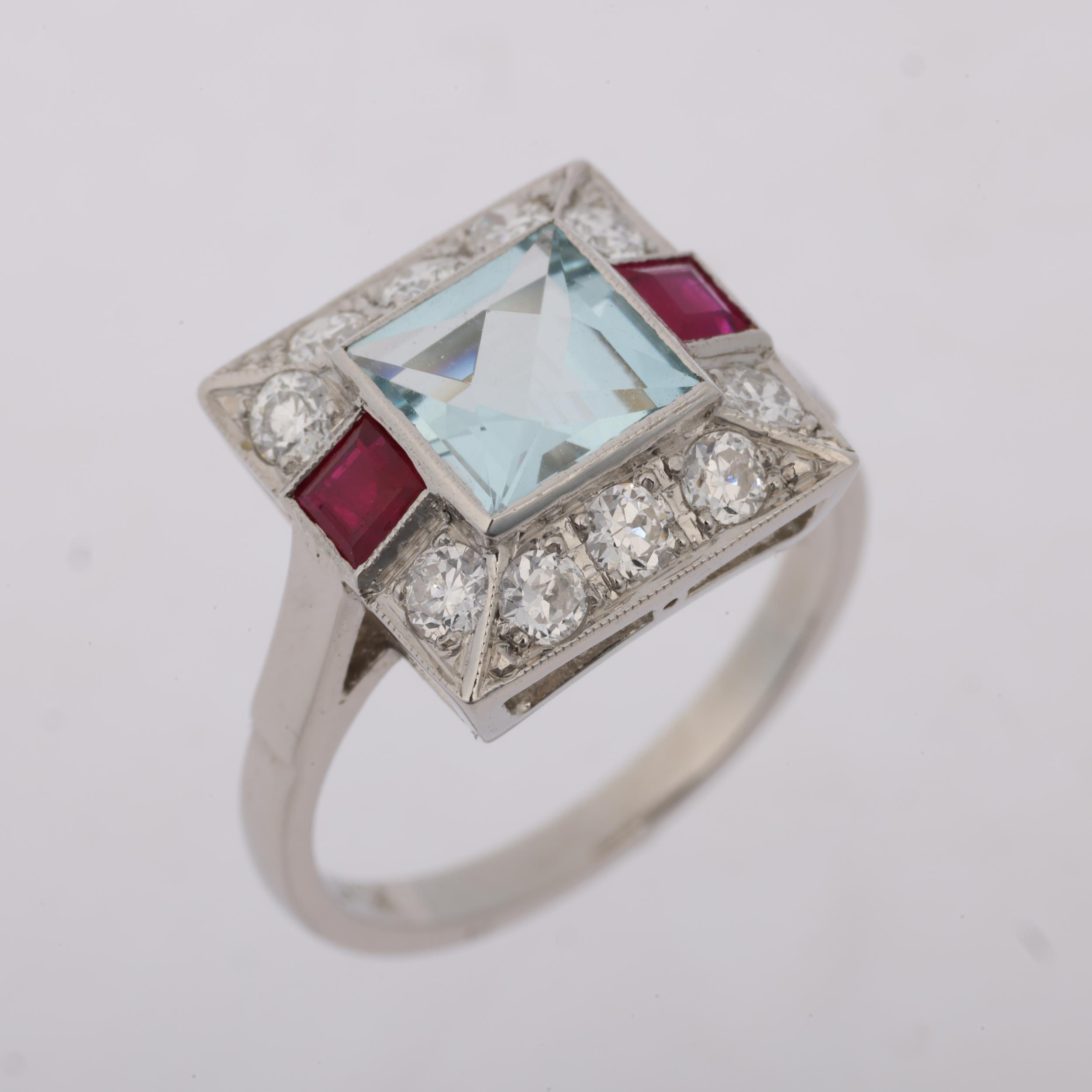 An Art Deco style platinum aquamarine ruby and diamond square panel ring, set with square-cut rubies - Image 2 of 4