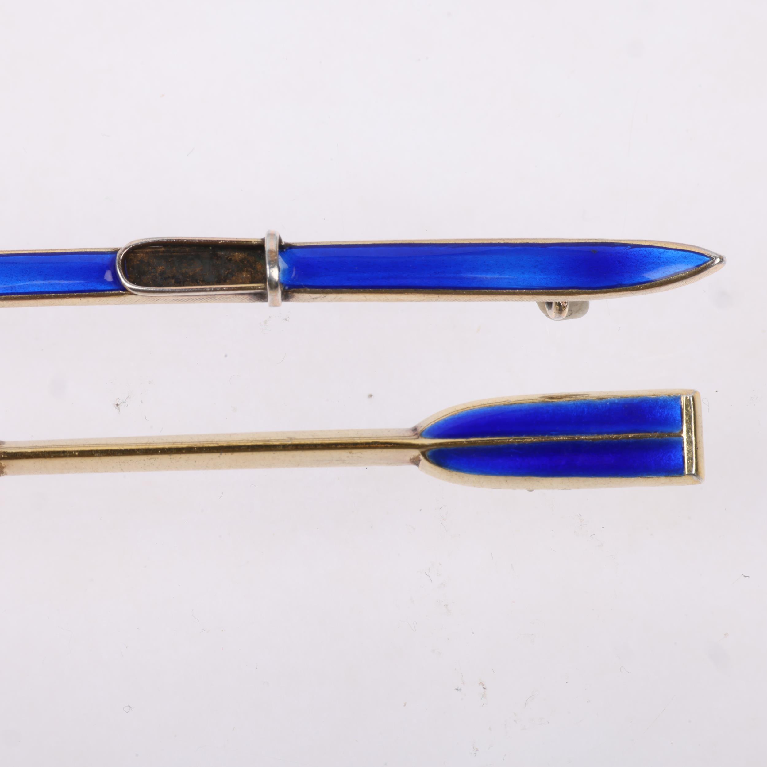 2 Scandinavian sterling silver-gilt blue enamel sporting brooches, comprising Norne Aksel Holmsen - Image 2 of 3