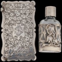 An Edwardian silver visiting card case, Walker & Hall, Chester 1906, allover foliate engraved