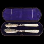 A pair of Victorian silver mother-of-pearl handled butter knives, Harrison Brothers & Howson,