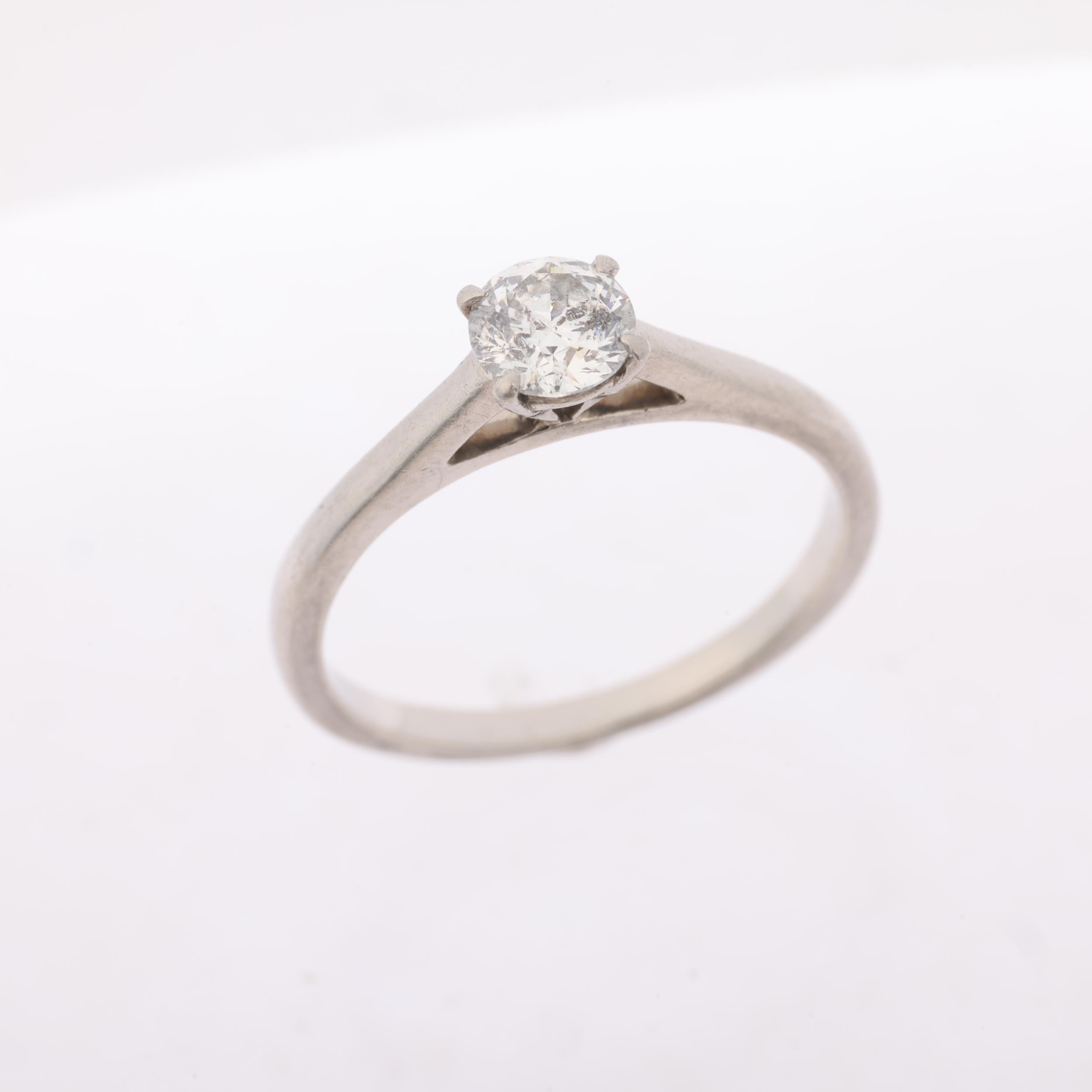 A modern platinum 0.5ct solitaire diamond ring, claw set with modern round brilliant-cut diamond, - Image 2 of 4