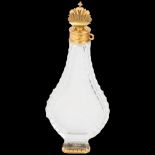 An 18th century French Louis XV gold-mounted crystal glass pear-shaped slimline scent bottle,