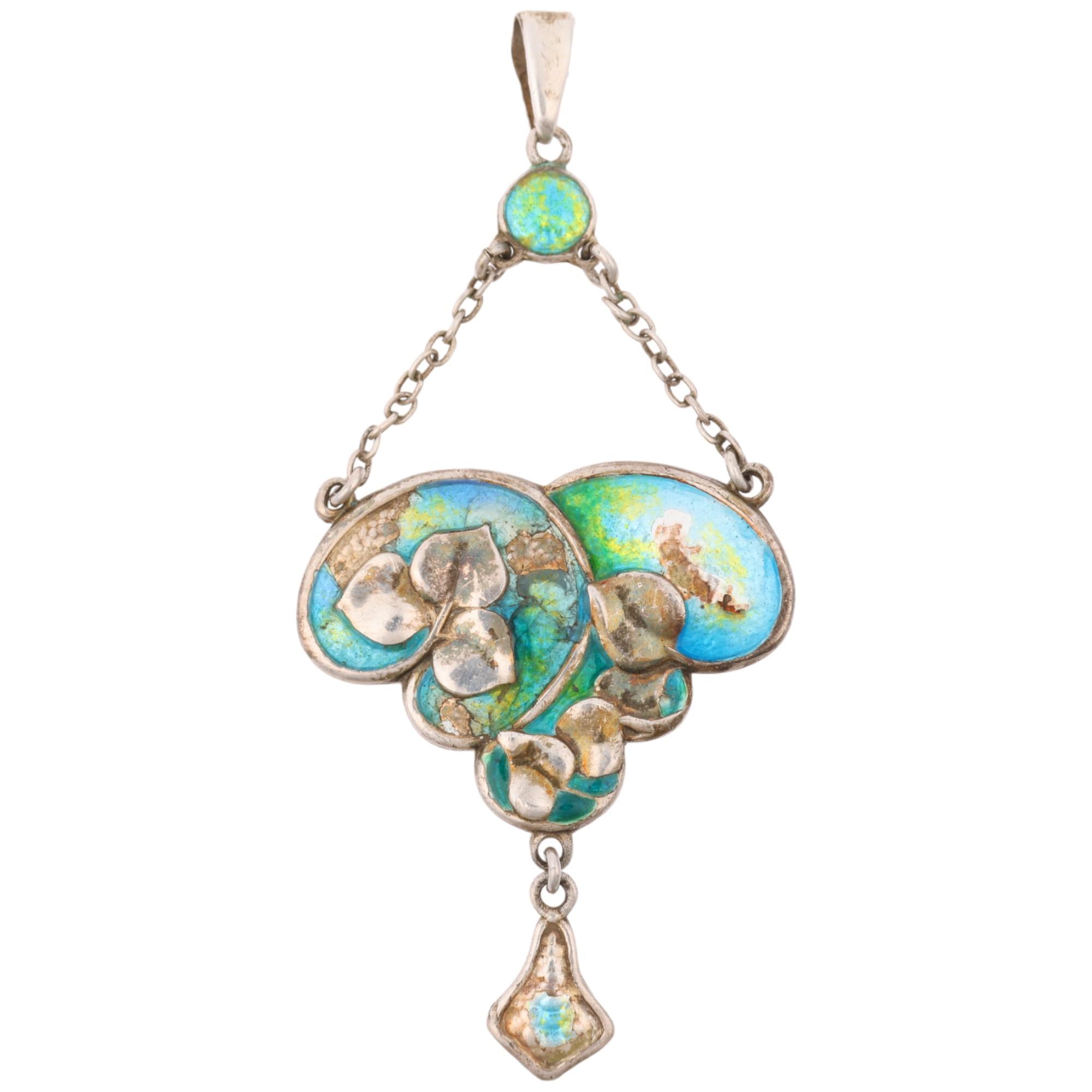 CHARLES HORNER - an Art Nouveau silver and peacock enamel floral lavalier pendant, maker CH,