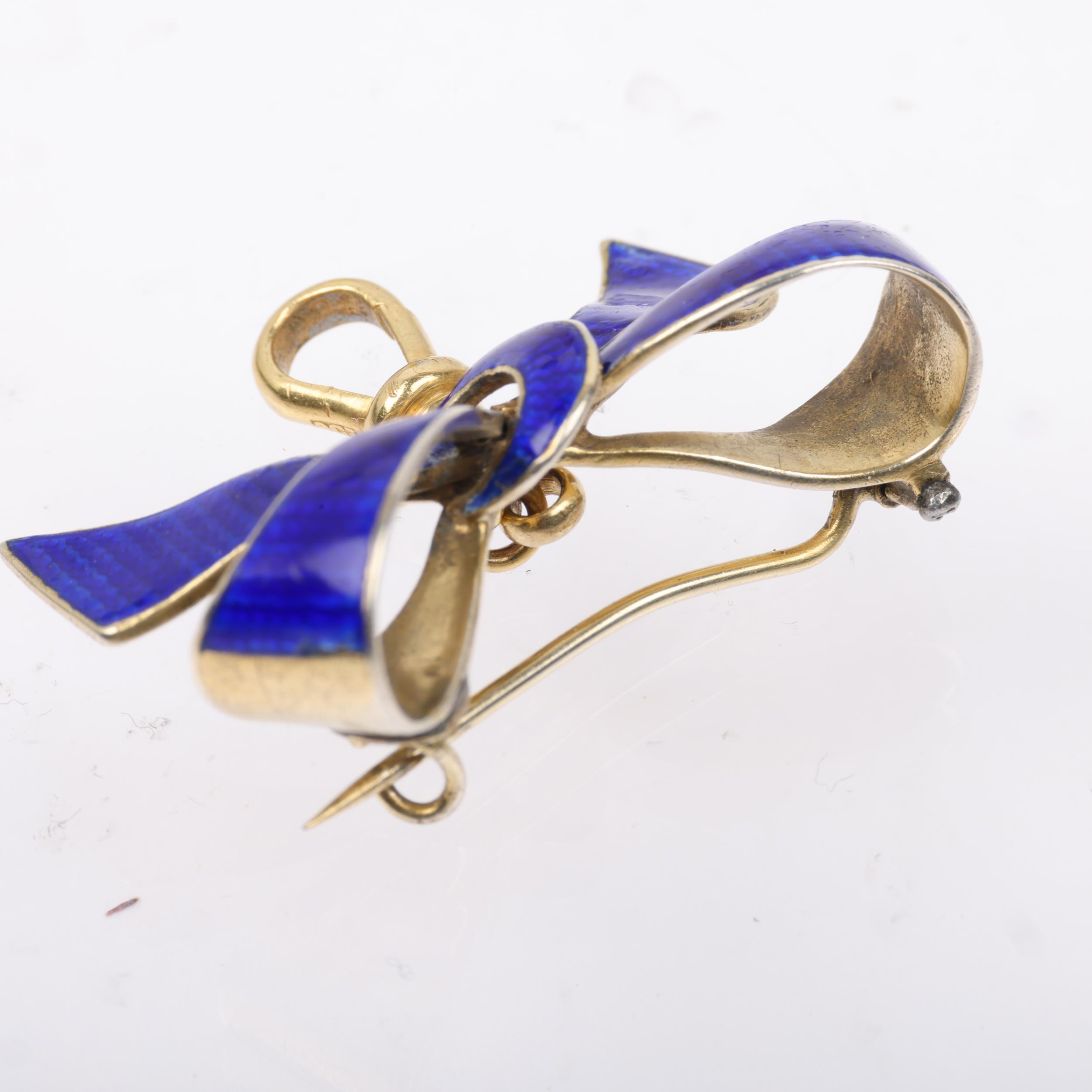 A Continental silver-gilt blue enamel ribbon bow brooch, with 9ct gold dog-clip, 34.6mm, 6.6g - Image 2 of 3