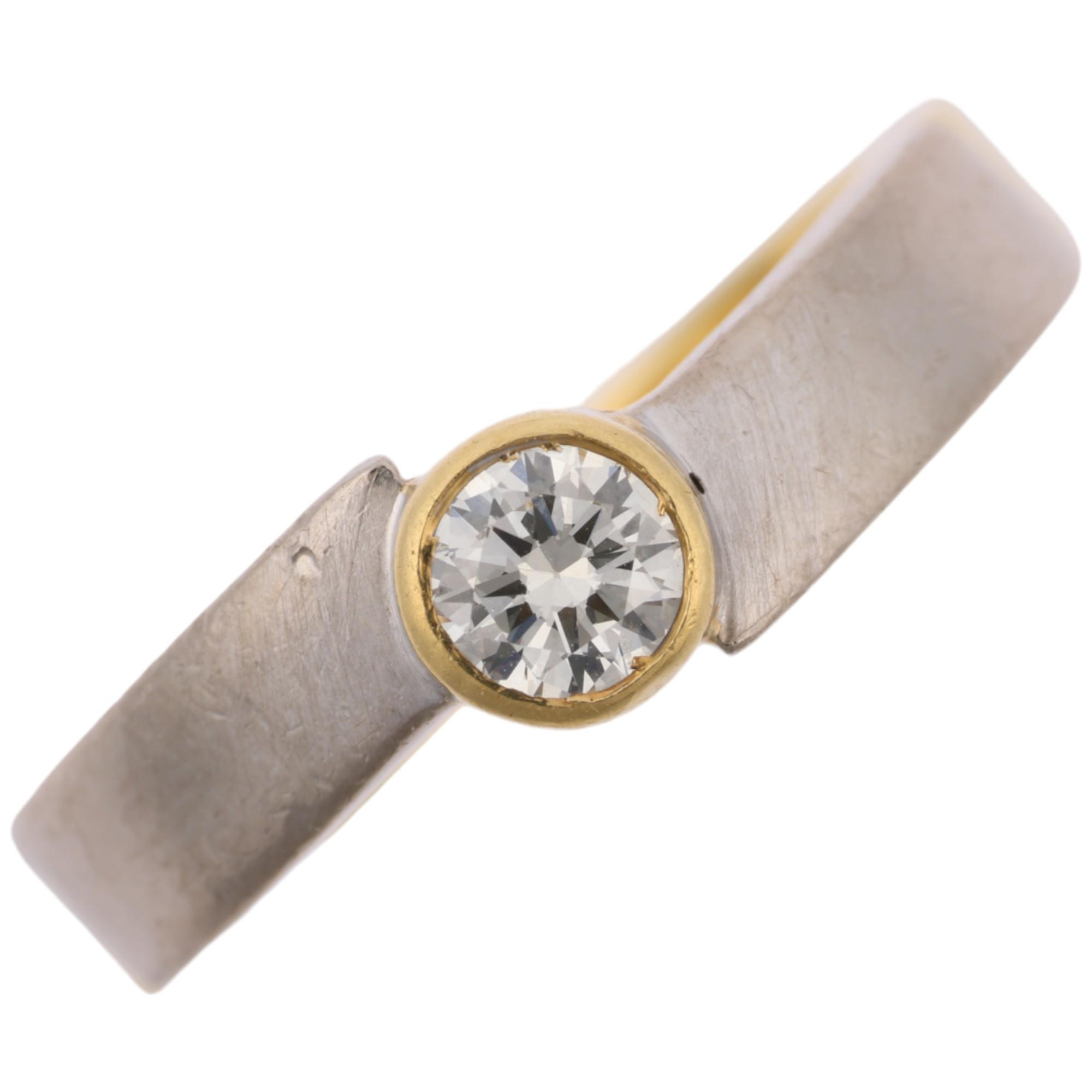 A Continental 18ct two-colour gold 0.25ct solitaire diamond ring, setting height 6.3mm, size L, 5.7g