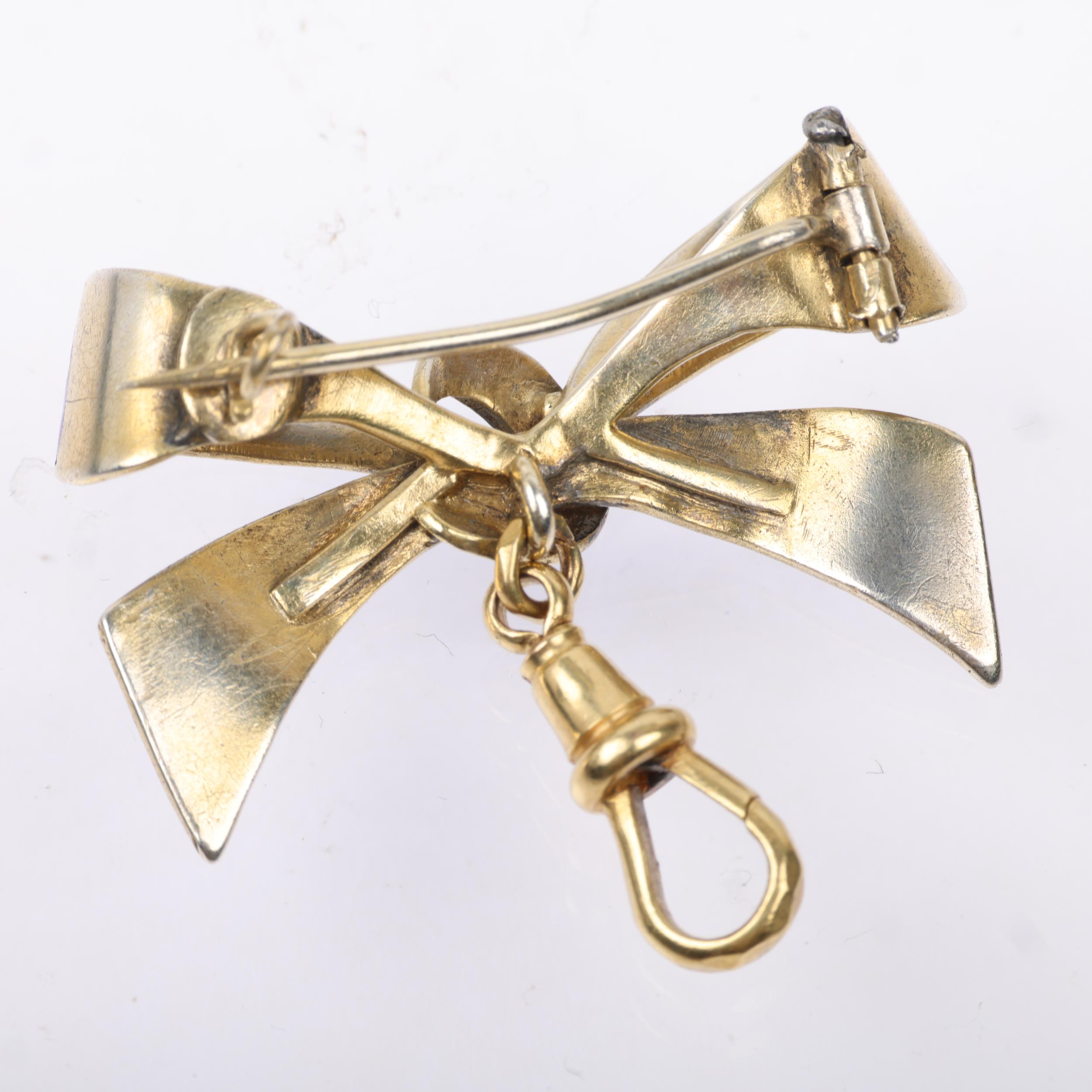 A Continental silver-gilt blue enamel ribbon bow brooch, with 9ct gold dog-clip, 34.6mm, 6.6g - Image 3 of 3