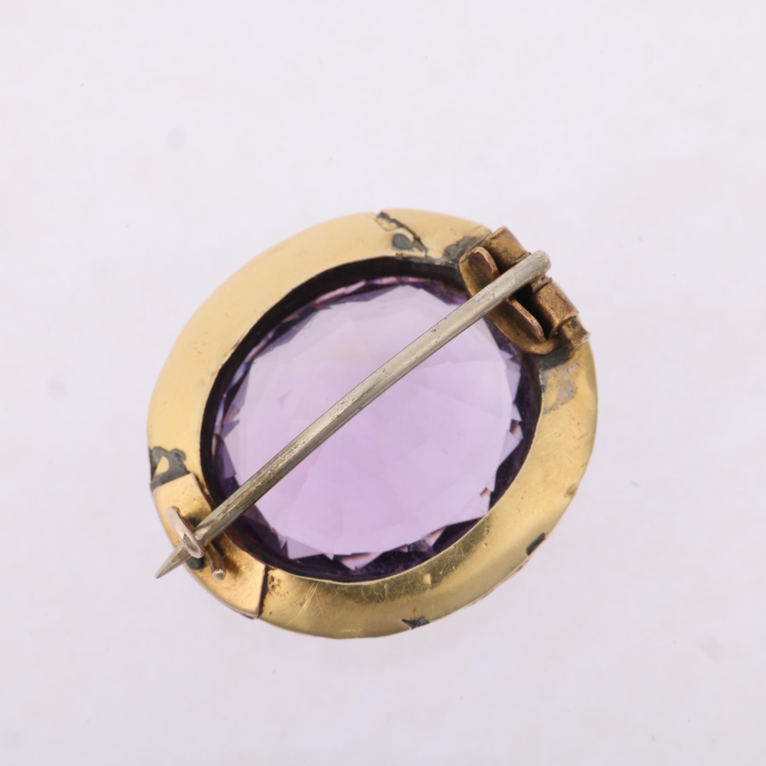 A Georgian amethyst brooch, circa 1820, cut-down collet set with 16ct oval mixed-cut amethyst, - Image 2 of 4