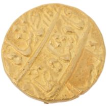 A Mughal Empire Mohur gold coin, 20.5mm, 10.7g Condition Report: A few very light filing marks to