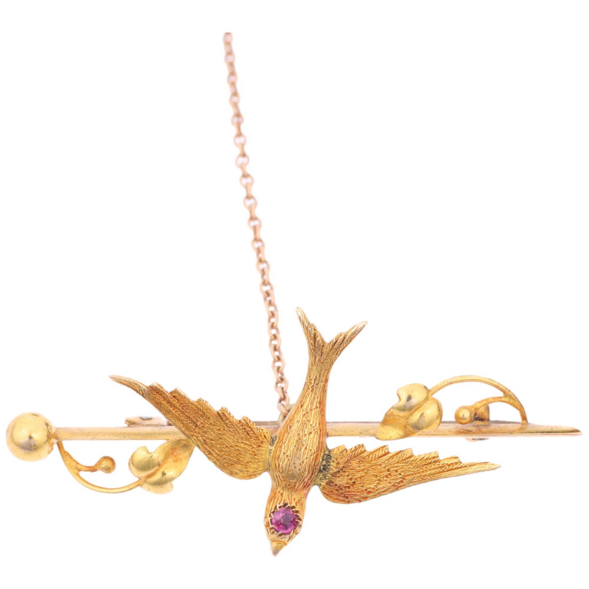 A Victorian 15ct gold ruby swallow bird bar brooch, 47mm, 4g Condition Report: No damage or