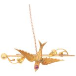 A Victorian 15ct gold ruby swallow bird bar brooch, 47mm, 4g Condition Report: No damage or