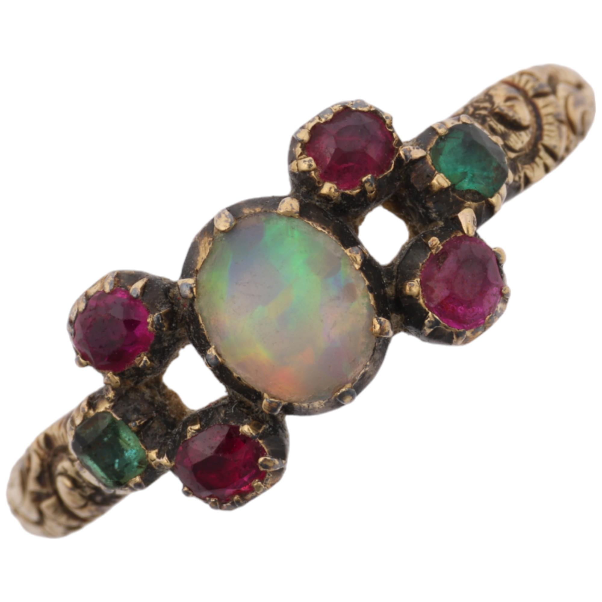 A Georgian opal ruby and chrysolite sweetheart ring, circa 1820, cut-down collet set with oval