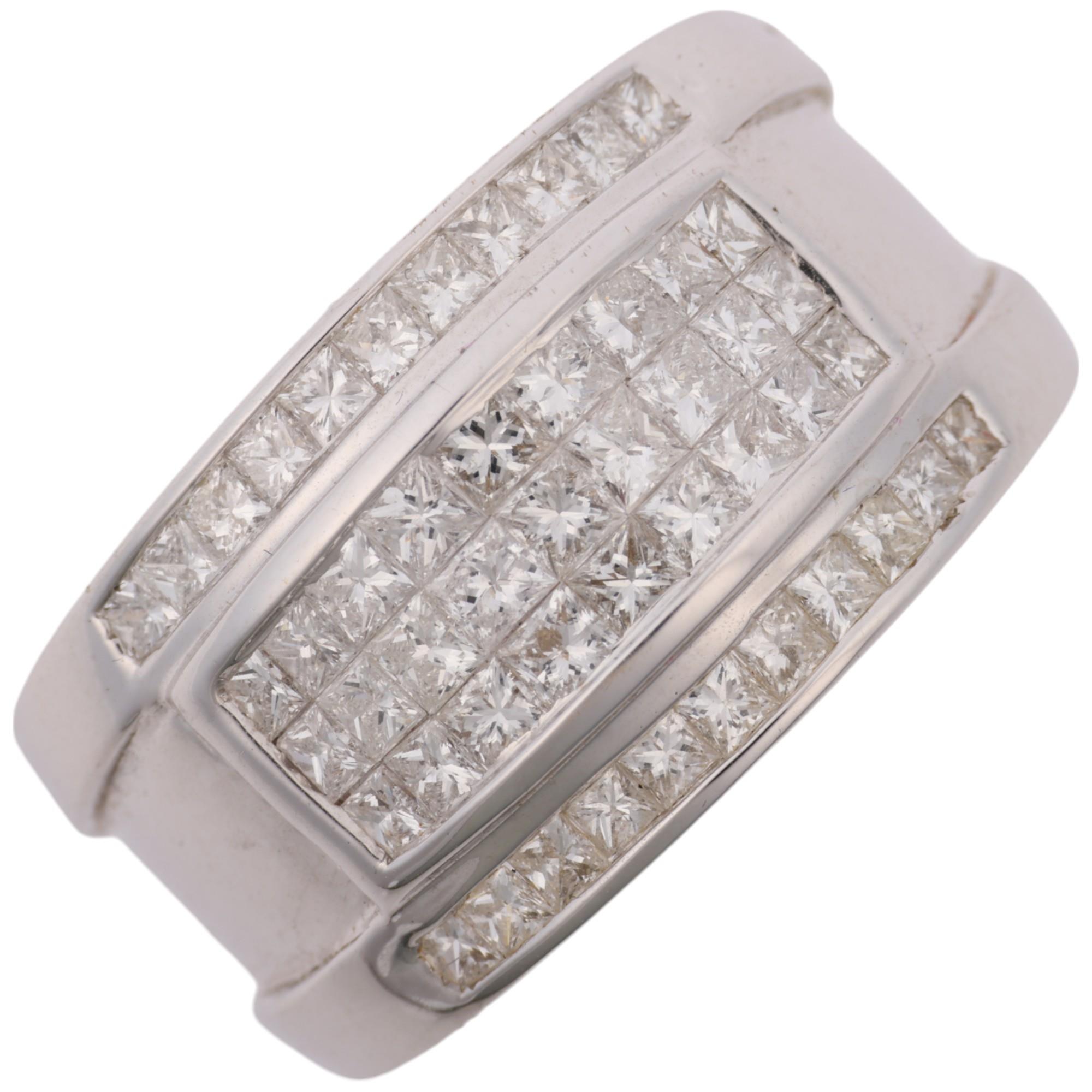 A large modern heavy 18ct white gold diamond band ring, set with Princess-cut diamonds, total