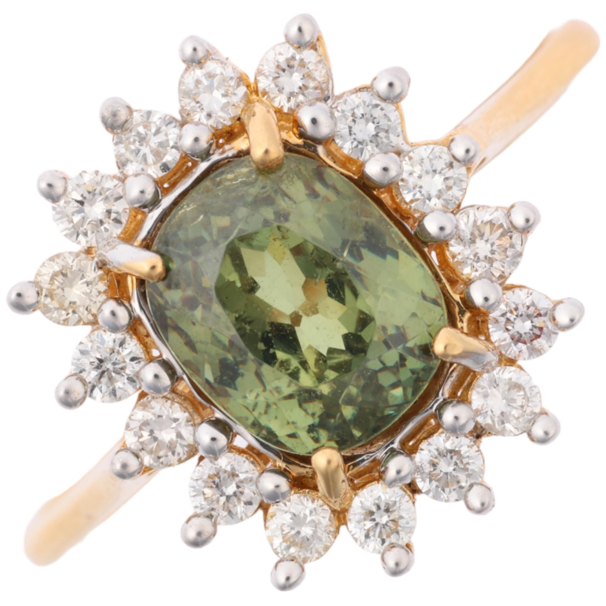 A modern 18ct gold demantoid garnet and diamond flowerhead cluster ring, maker CR, Birmingham