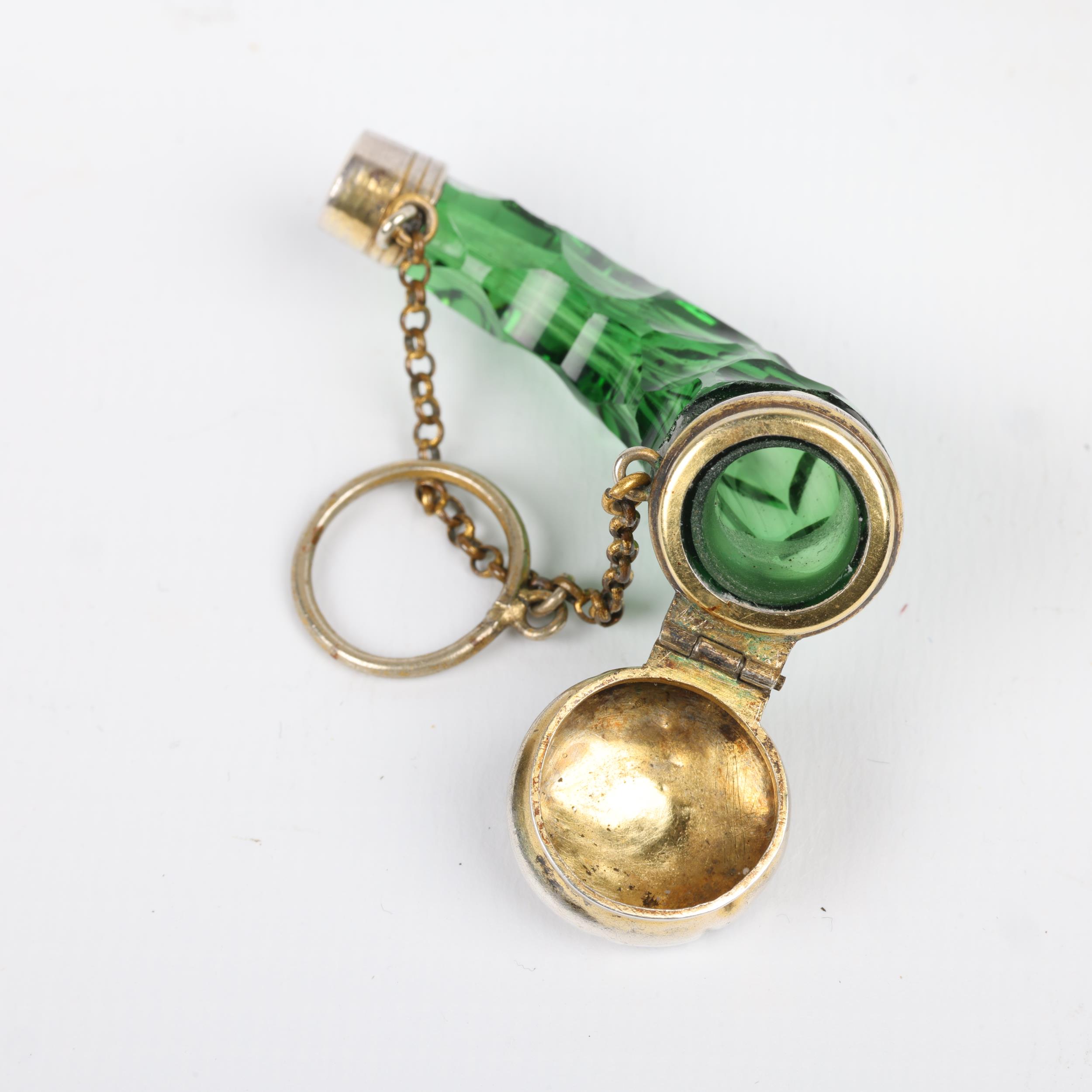 A Victorian miniature silver-mounted green glass cornucopia scent bottle, the faceted glass body - Image 3 of 3