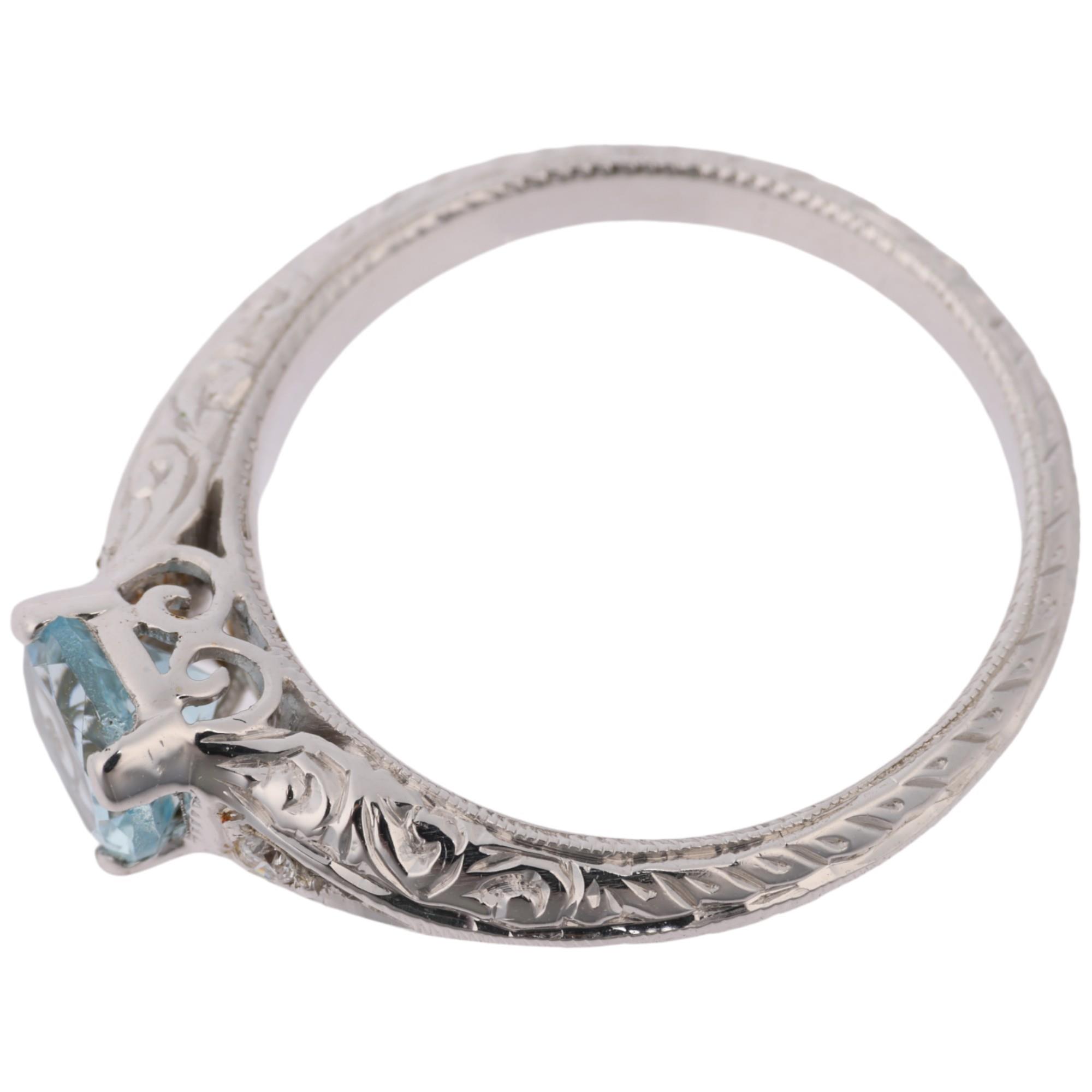 A modern 18ct white gold aquamarine and diamond dress ring, in Art Deco style, claw set with 0.7ct - Image 3 of 4