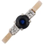 A 9ct gold three stone sapphire and diamond ring, setting height 4.7mm, size M, 2.1g Condition