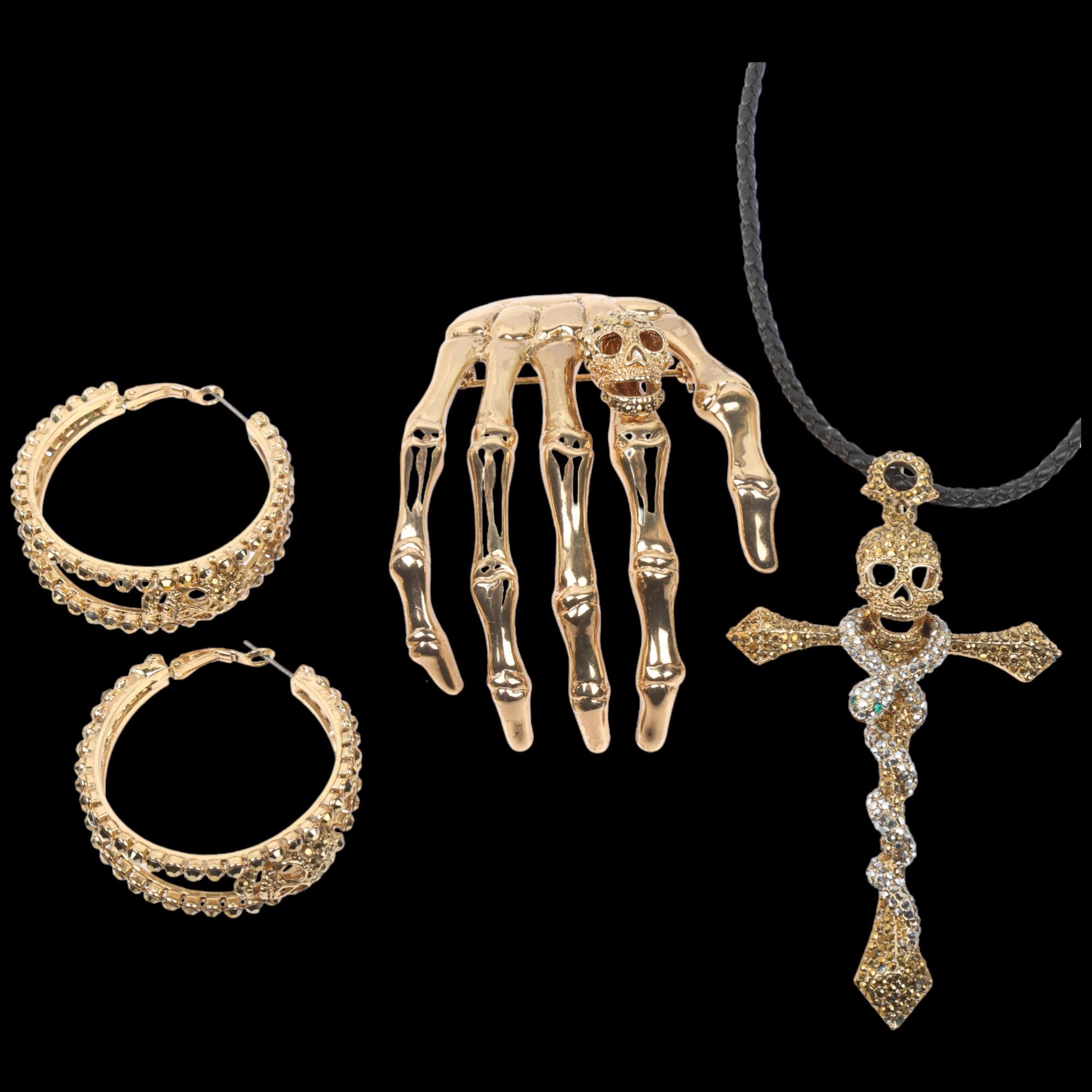 BUTLER & WILSON - a Vintage gilt-metal rhinestone skull jewellery set, comprising snake cross