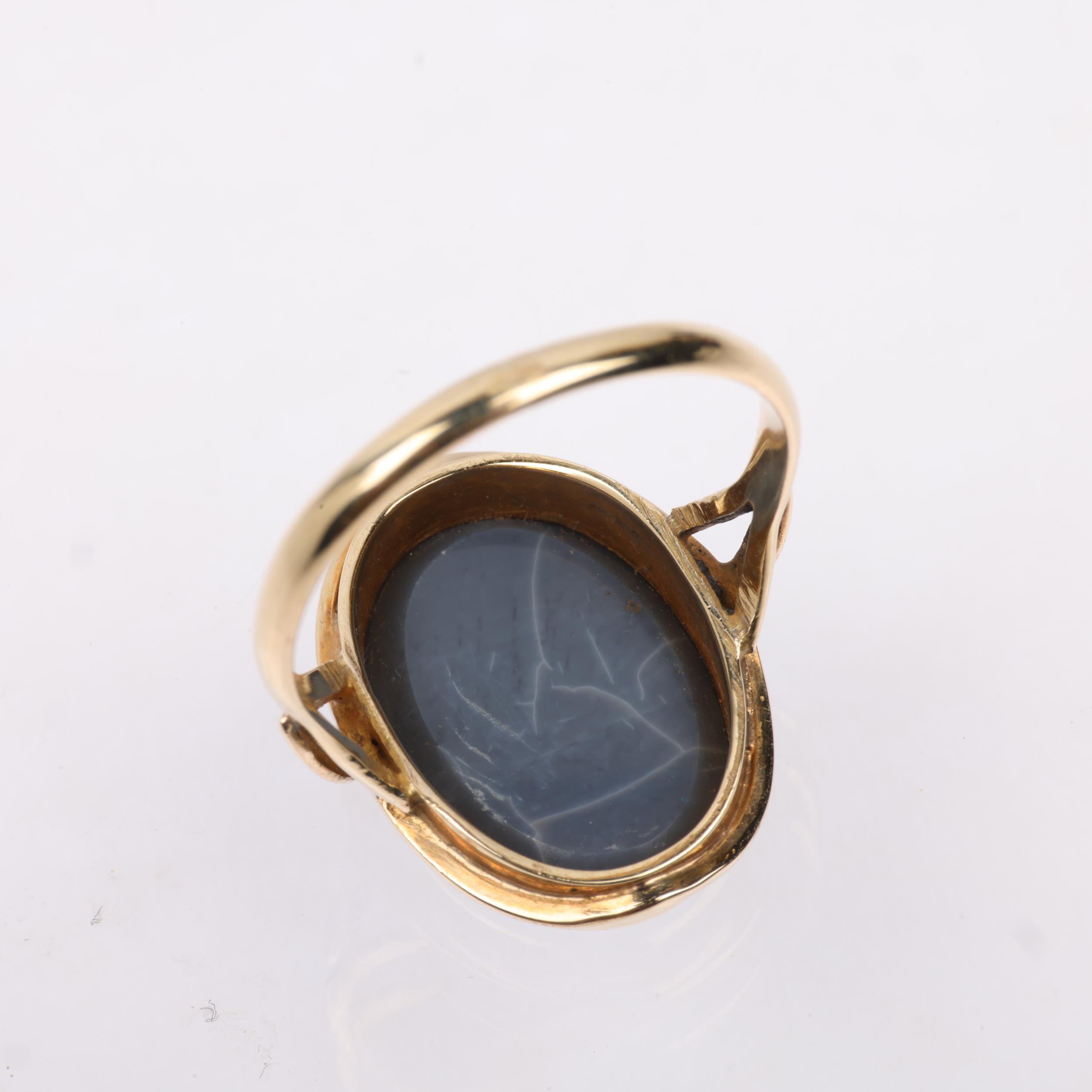 A late 20th century black opal doublet dress ring, apparently unmarked Continental gold settings, - Image 3 of 4