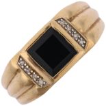 A large modern 9ct gold onyx and diamond signet ring, setting height 9.4mm, size V, 4.3g Condition