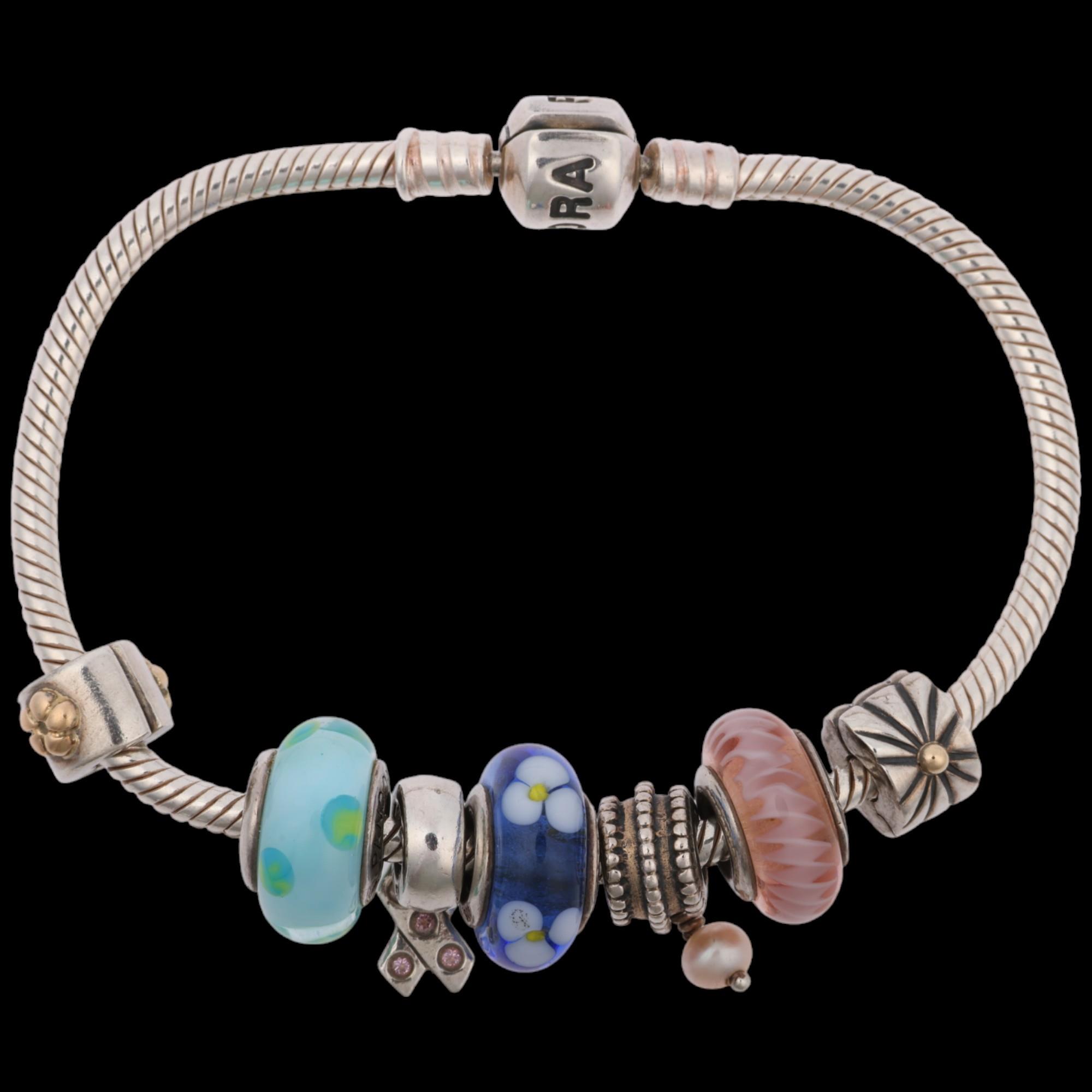 PANDORA - a sterling silver snake link charm bracelet, with 7 silver charms, 18cm, 31.3g Condition