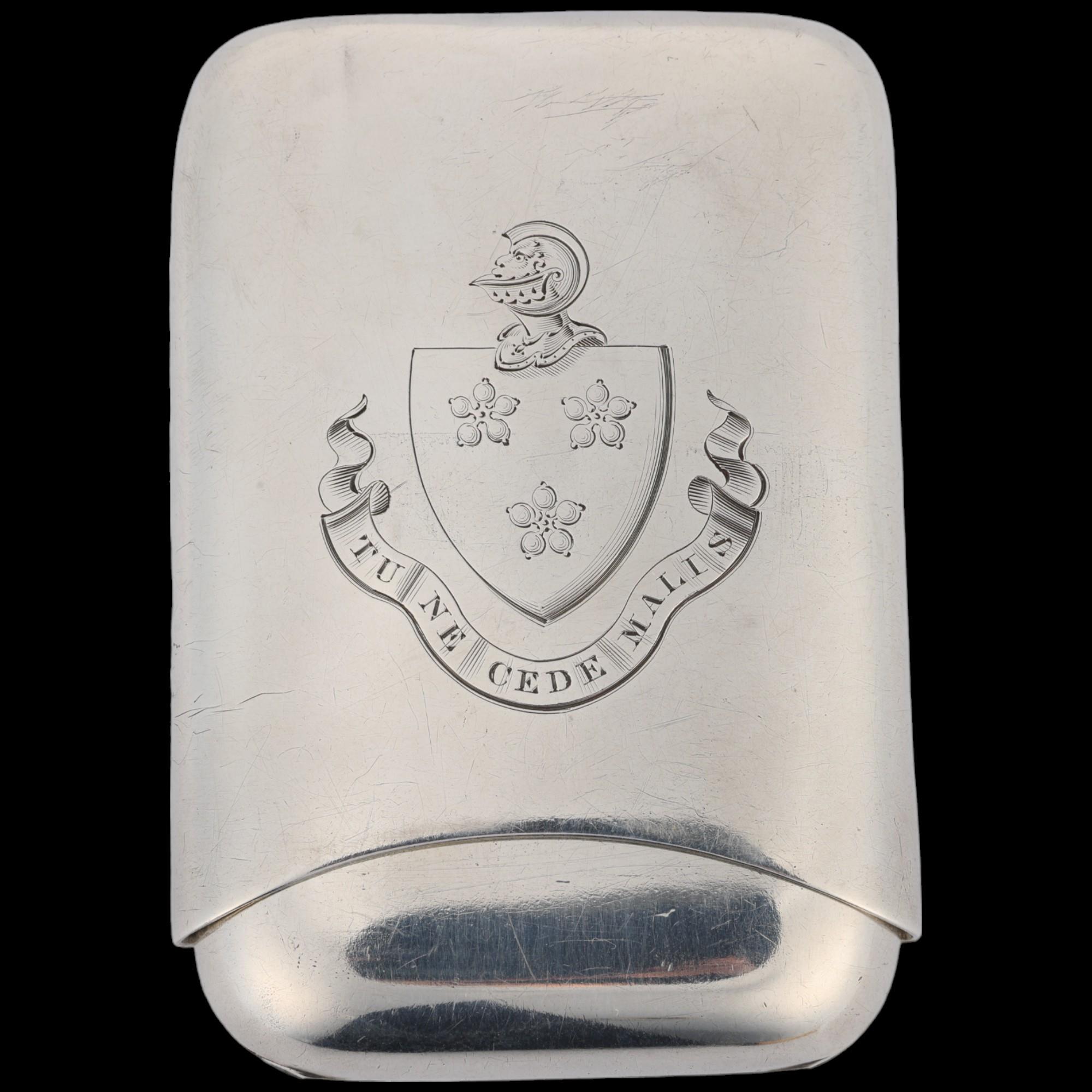 A Victorian silver armorial 'Cigar' cigarette case, E H Stockwell, London 1878, with engraved