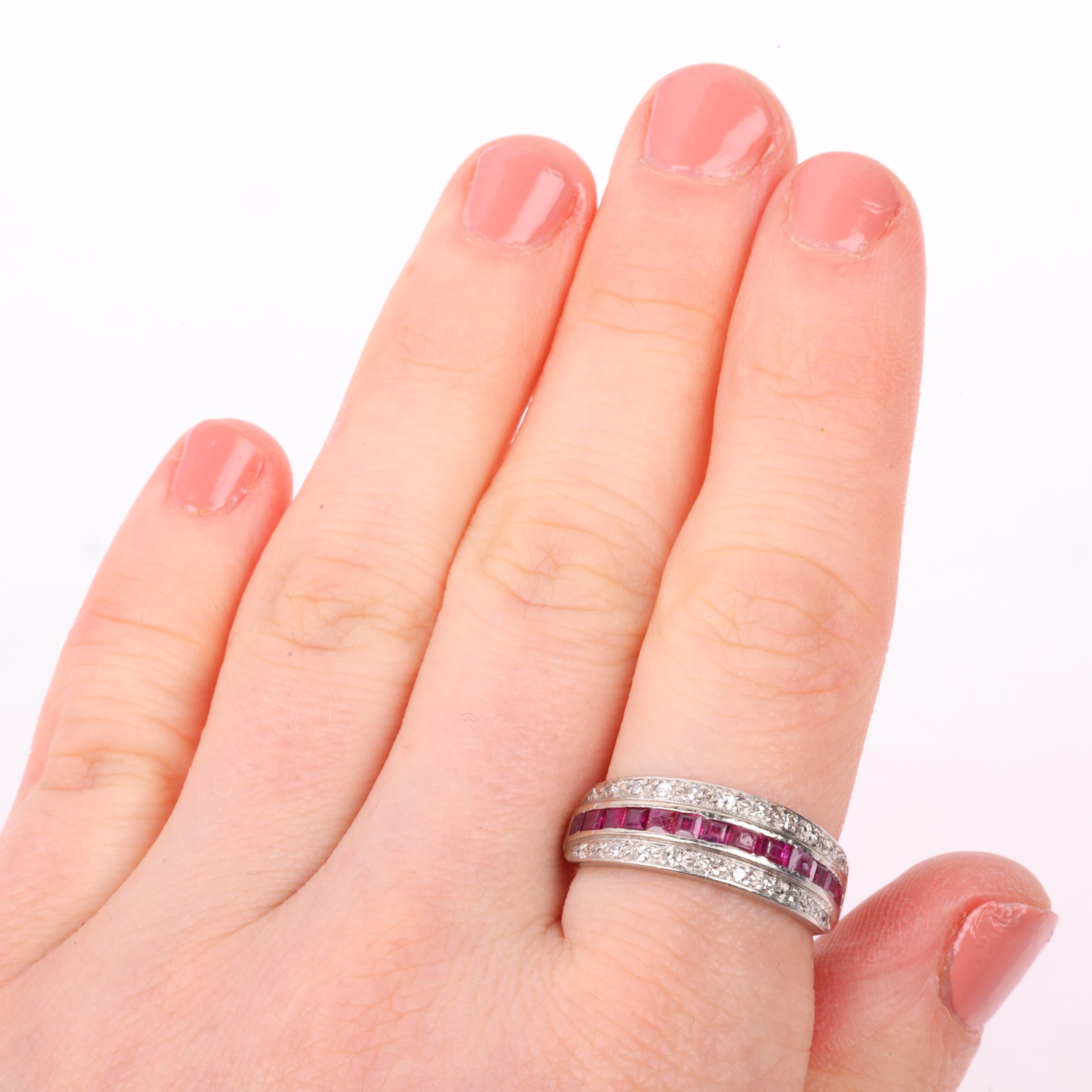 An Art Deco ruby and diamond triple row half eternity ring, circa 1925, channel and pave set with - Image 4 of 4
