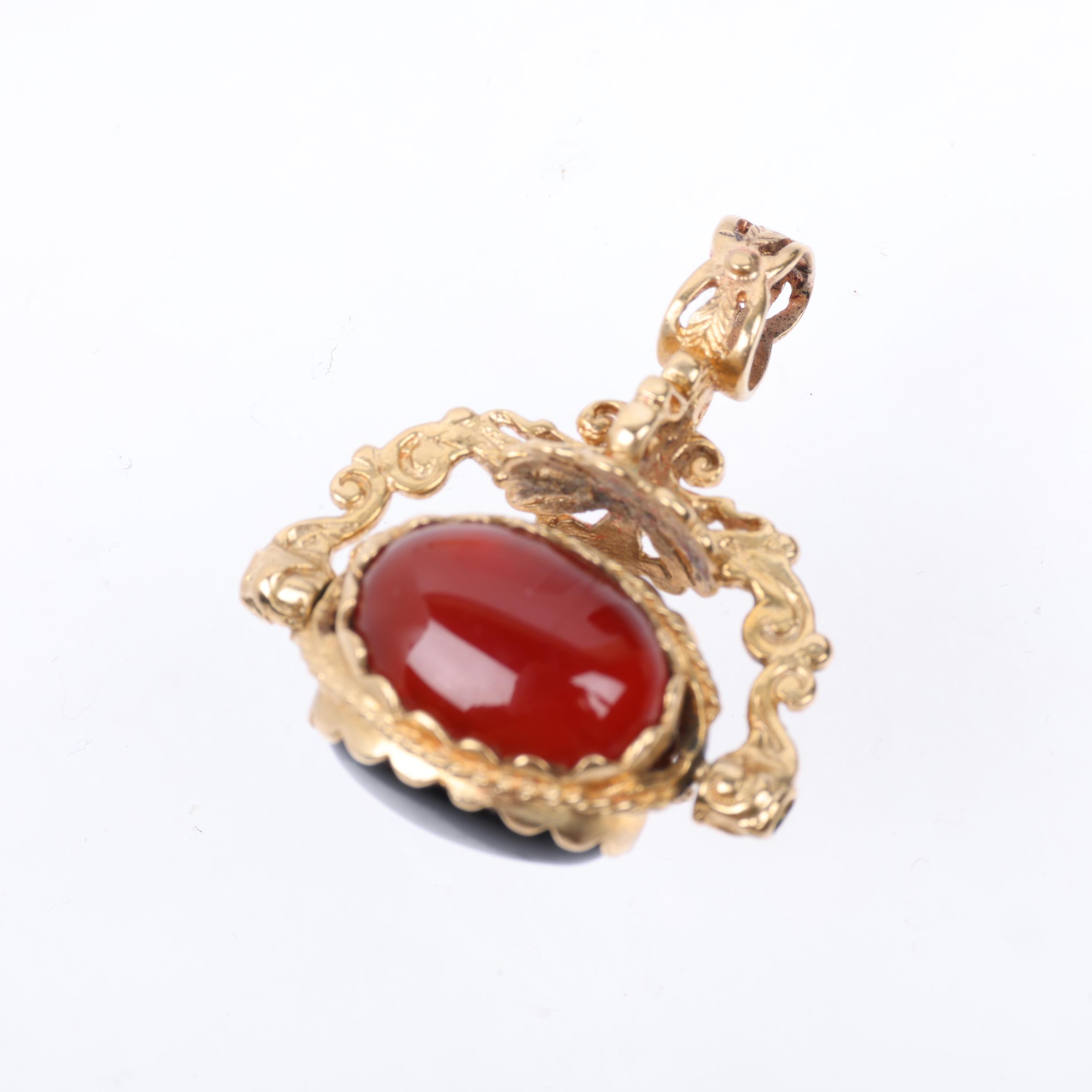 A late 20th century 9ct gold hardstone swivel fob, 30.9mm, 8g Condition Report: No damage or repair, - Image 3 of 4