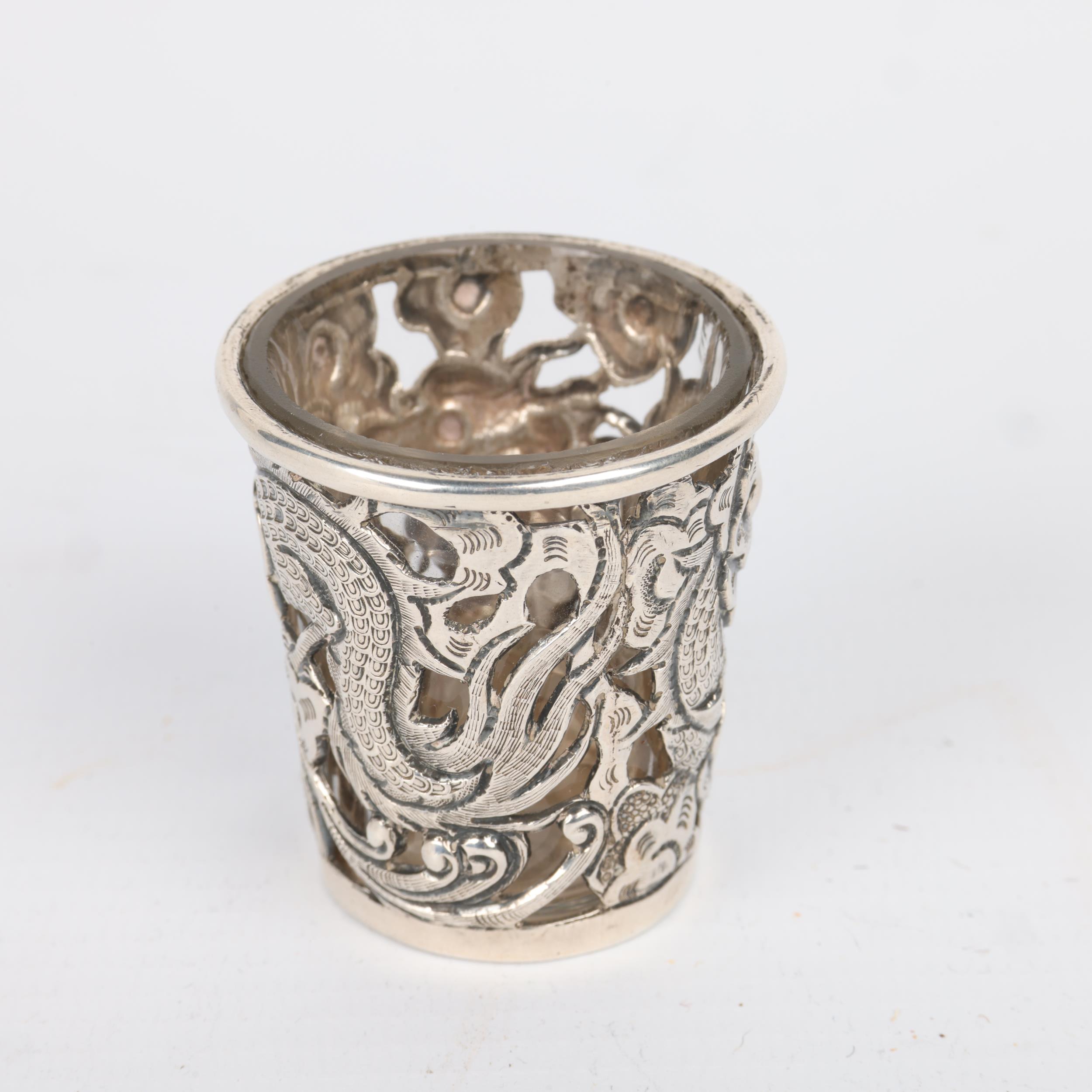 A Chinese export silver 'Dragon' drinking tot, circa 1900, signed with Artisan mark, retailed by - Image 2 of 3