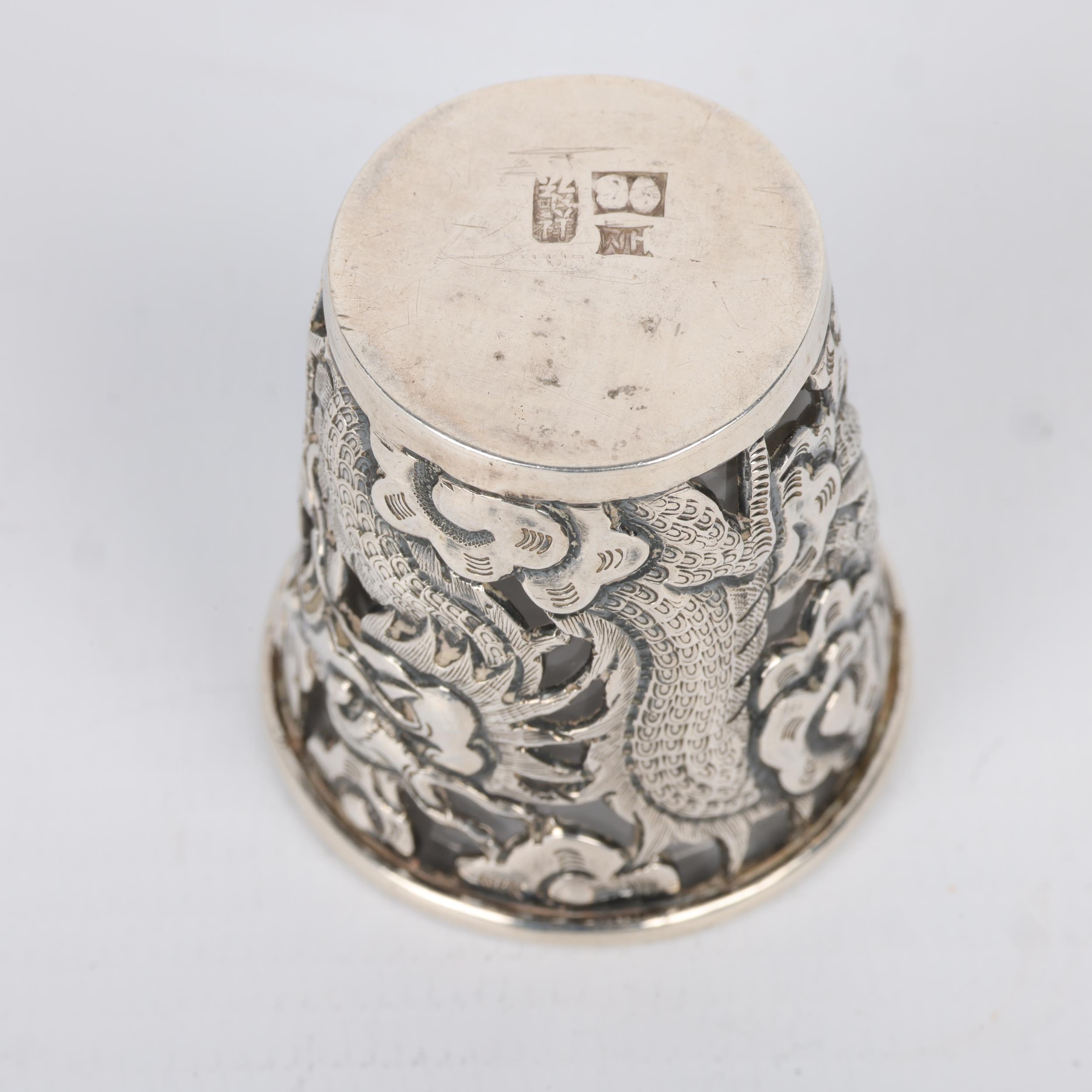 A Chinese export silver 'Dragon' drinking tot, circa 1900, signed with Artisan mark, retailed by - Image 3 of 3