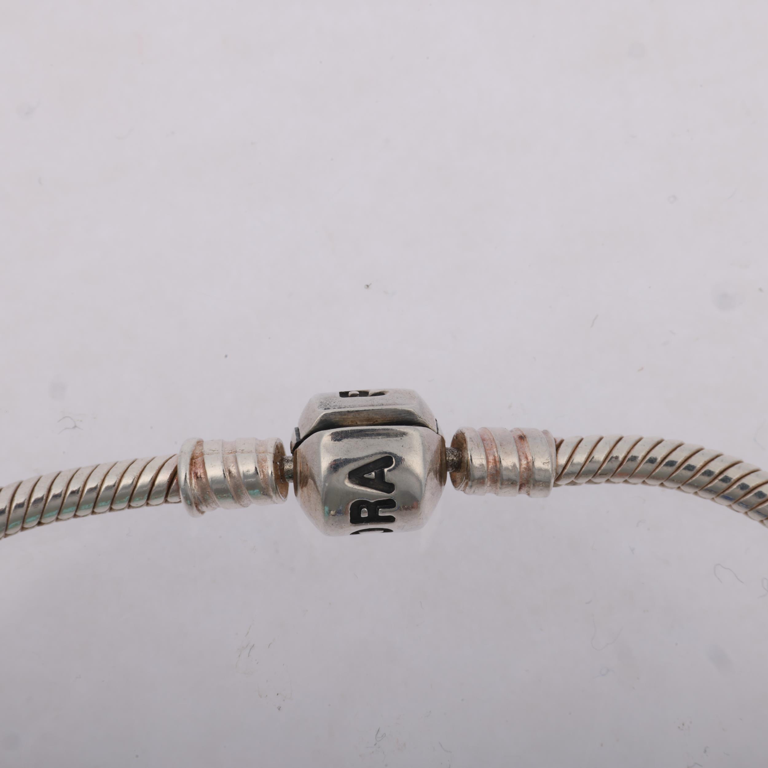 PANDORA - a sterling silver snake link charm bracelet, with 7 silver charms, 18cm, 31.3g Condition - Image 3 of 3