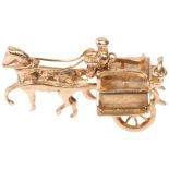 A late 20th century Irish 9ct gold novelty horse and cart charm/pendant, indistinct maker, Dublin