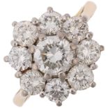 A late 20th century 18ct gold diamond flowerhead cluster ring, indistinct maker, London 1983, claw