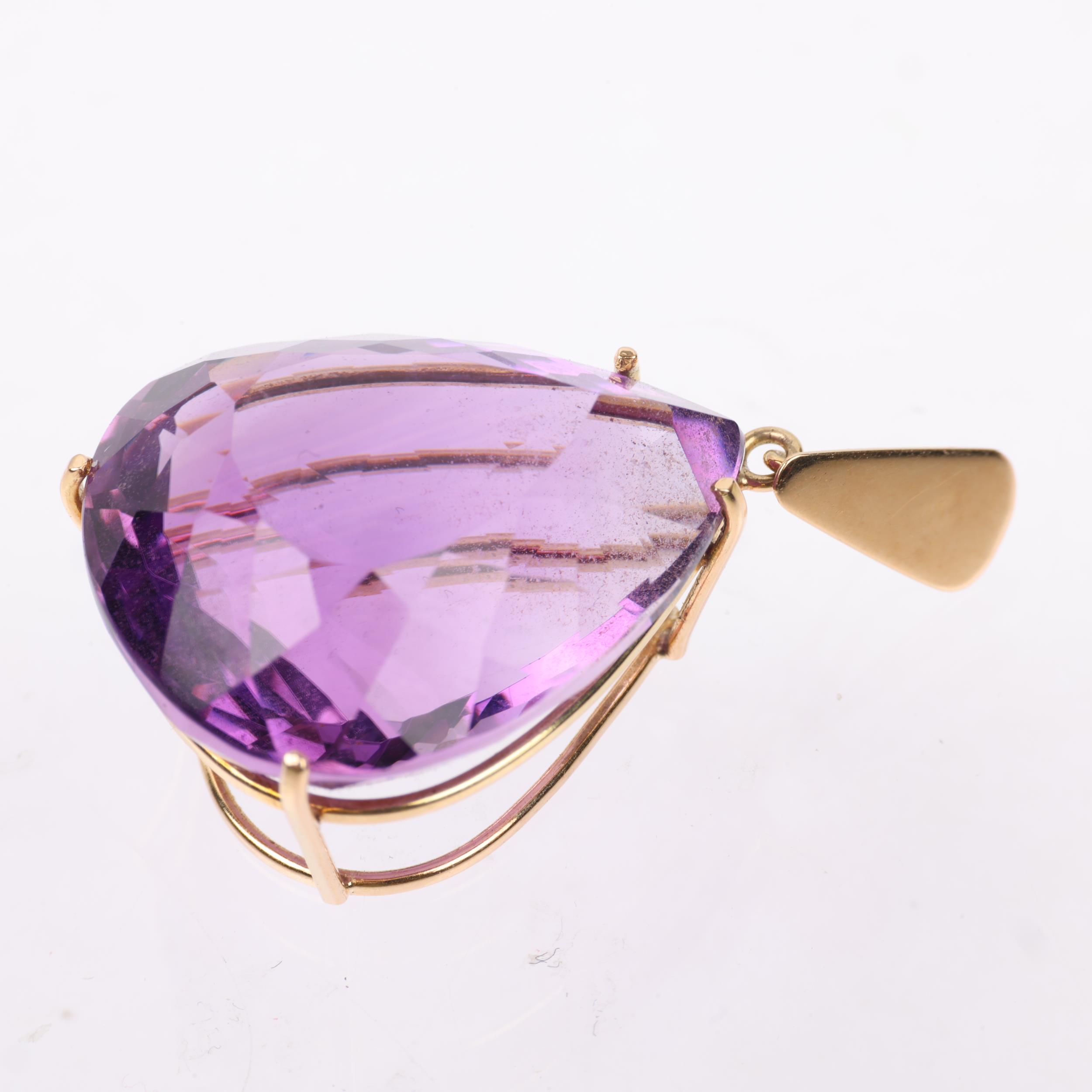 A 14ct gold amethyst drop pendant, set with 28ct pear-cut amethyst, 33.4mm, 6.8g Condition Report: - Image 2 of 4