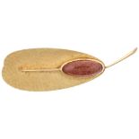 A 1960s goldstone stylised leaf brooch, indistinct mark on pin, 57.8mm, 6.9g Condition Report: No