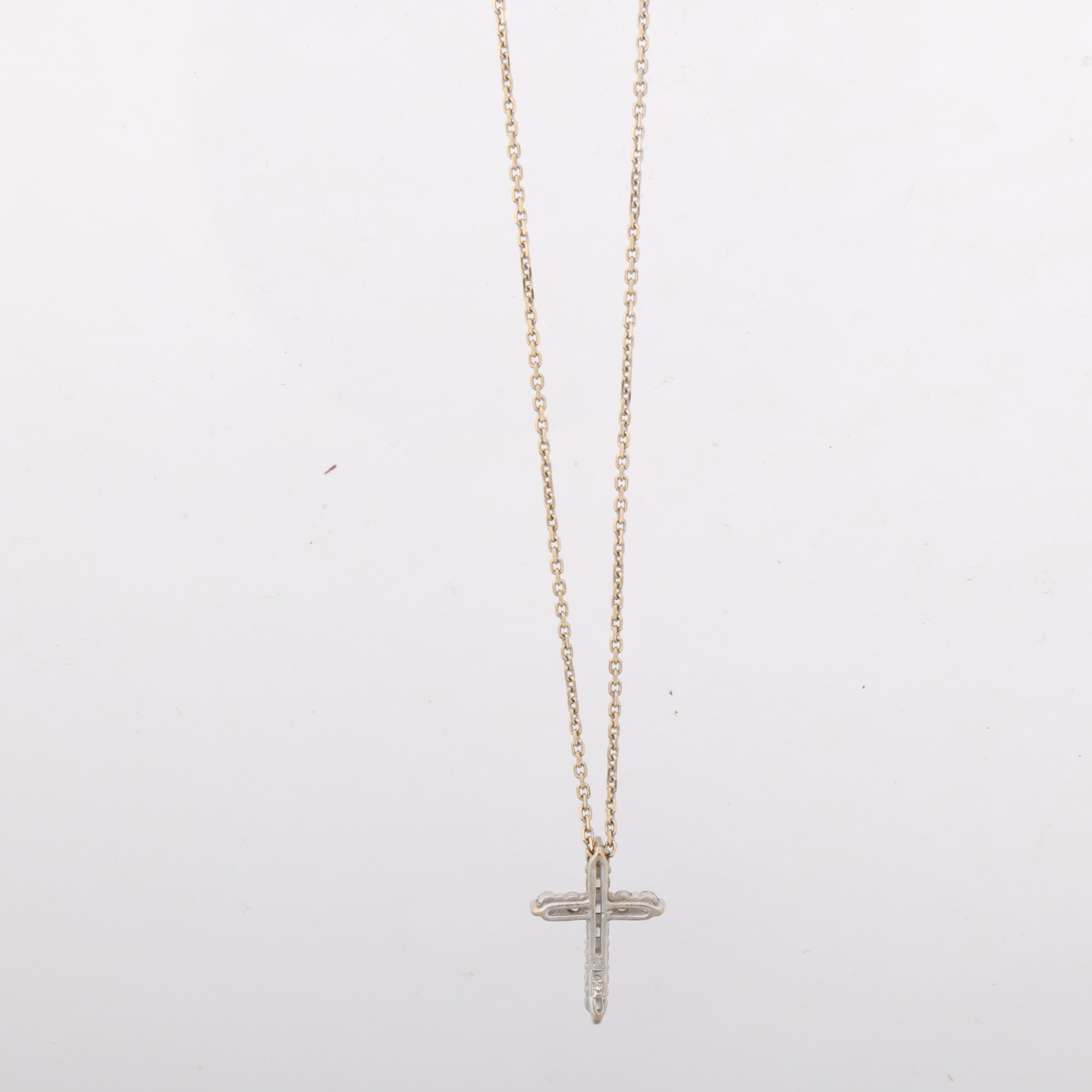 An 18ct white gold diamond cross pendant necklace, claw set with modern round brilliant-cut - Image 3 of 4