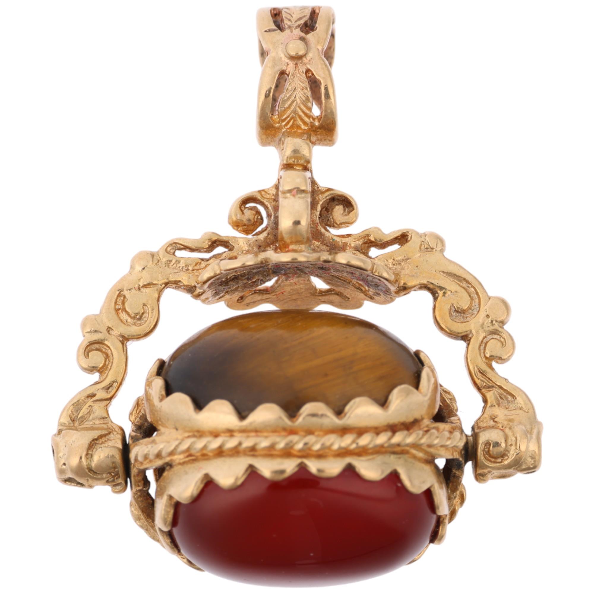 A late 20th century 9ct gold hardstone swivel fob, 30.9mm, 8g Condition Report: No damage or repair,