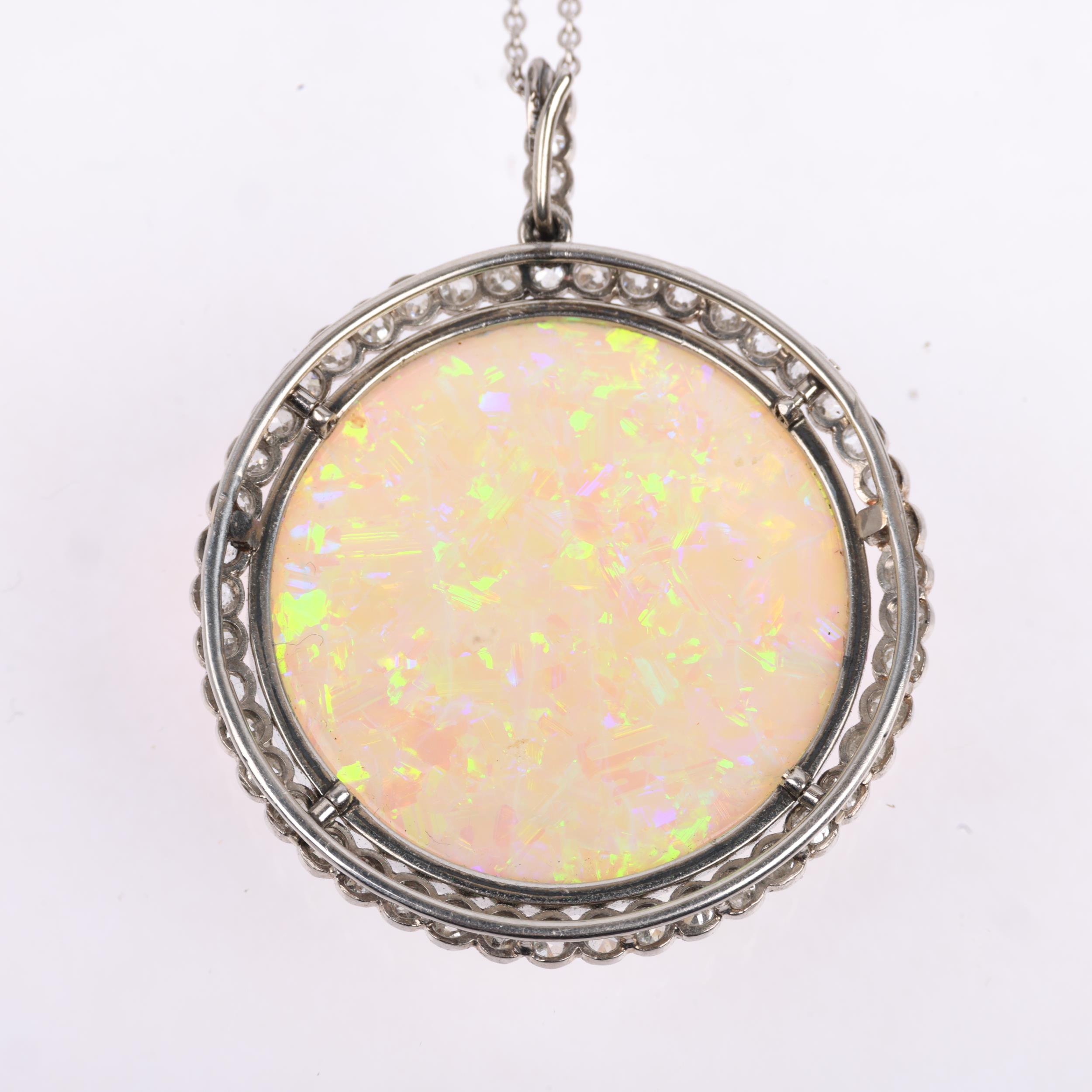 A Belle Epoque opal and diamond cluster pendant necklace, rub-over set with 15ct round cabochon opal - Image 3 of 5