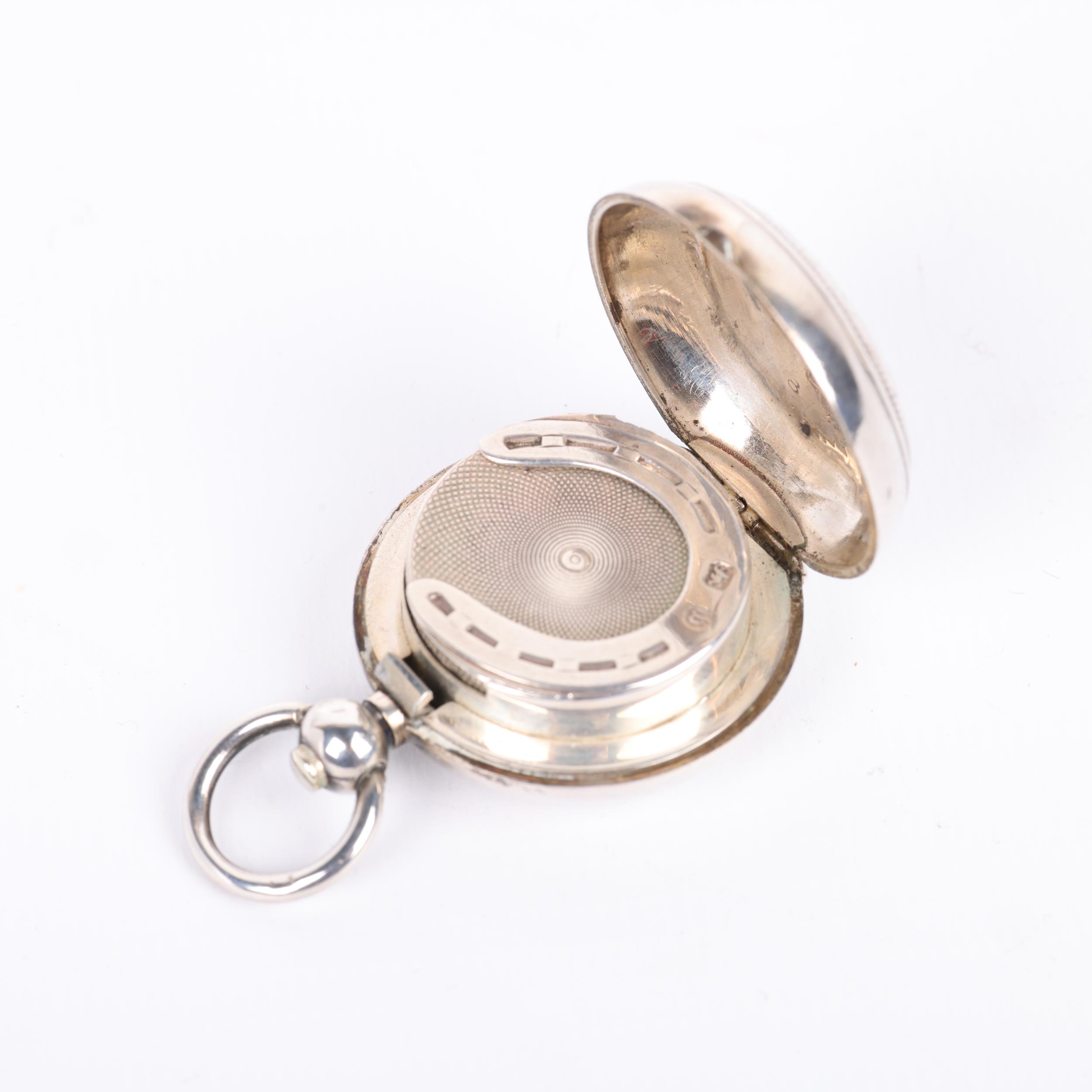 A Victorian silver sovereign case, Alfred Wigley, Birmingham 1895, circular form with foliate - Image 3 of 3