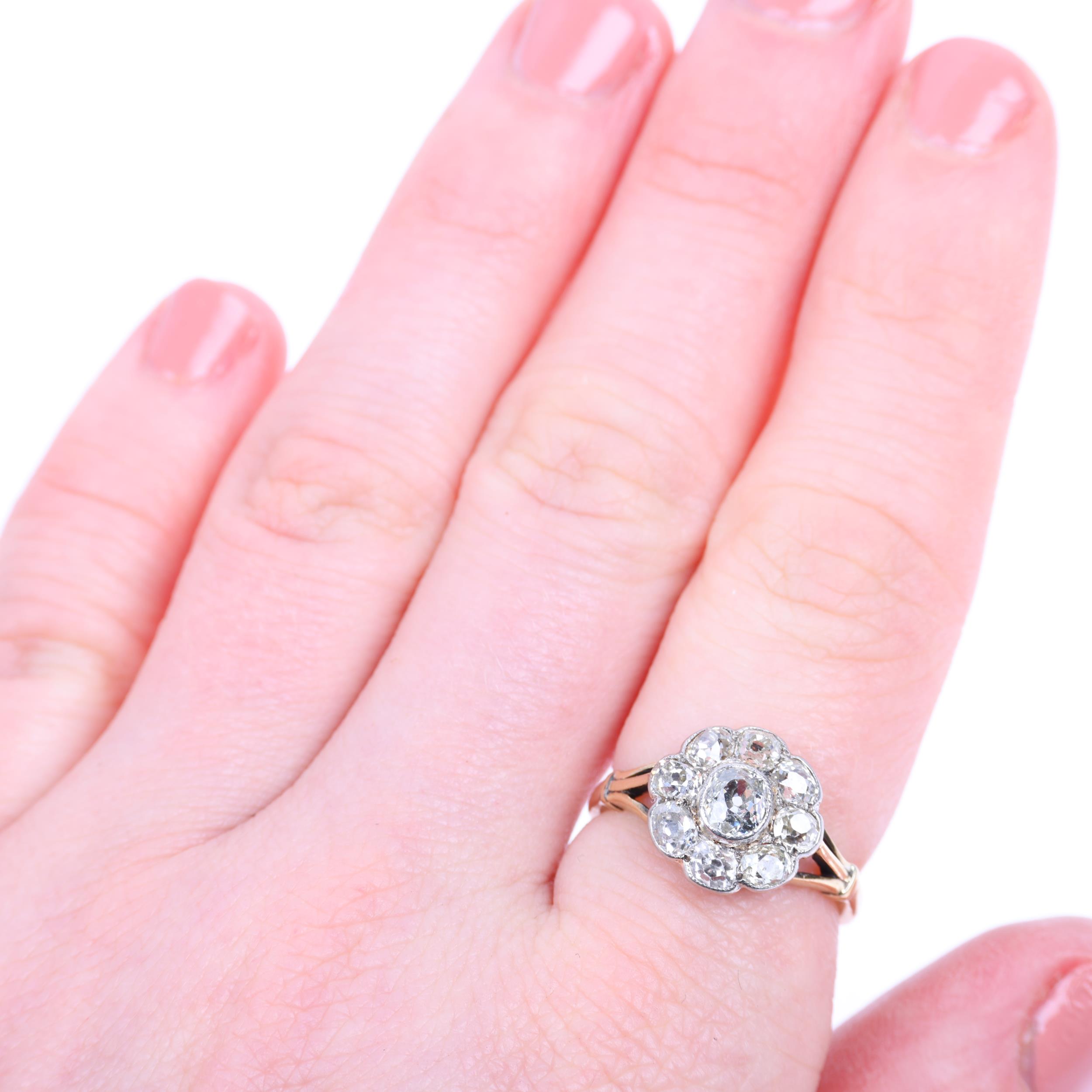 An 18ct gold diamond flowerhead cluster ring, rub-over set with old-cut diamonds, total diamond - Image 4 of 4