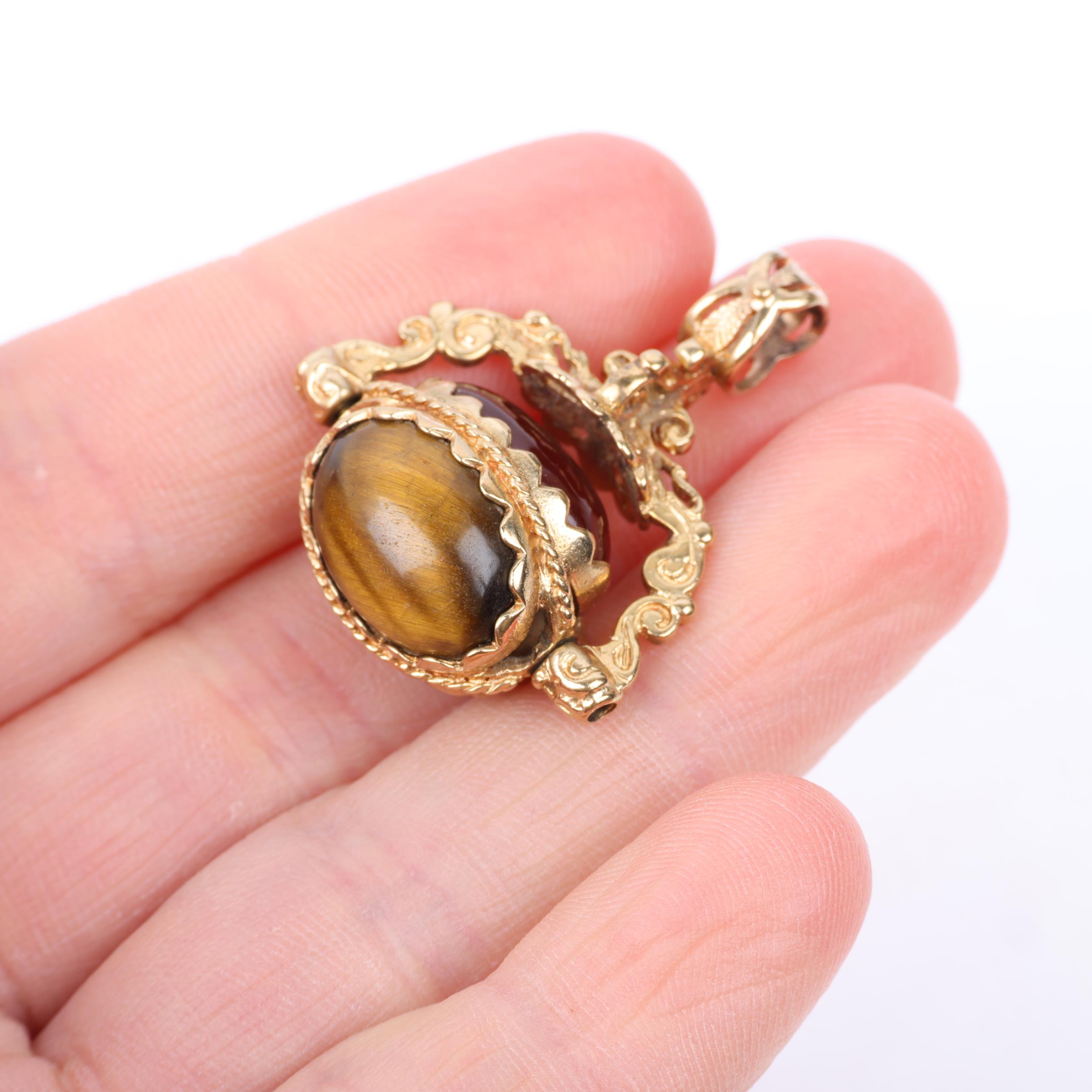 A late 20th century 9ct gold hardstone swivel fob, 30.9mm, 8g Condition Report: No damage or repair, - Image 4 of 4