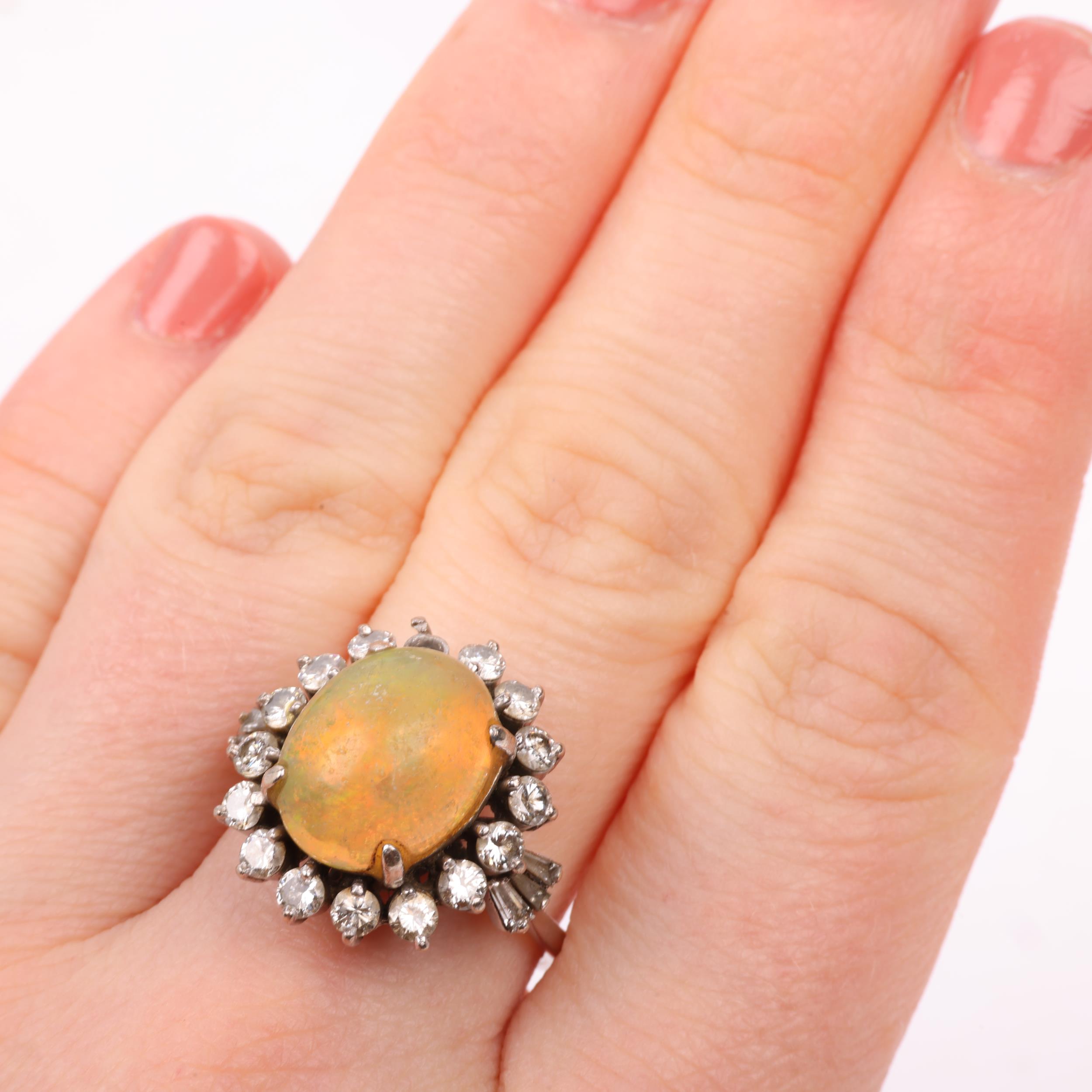 A 14ct white gold Ethiopian opal and diamond oval cluster ring, claw set with oval cabochon opal and - Image 4 of 4